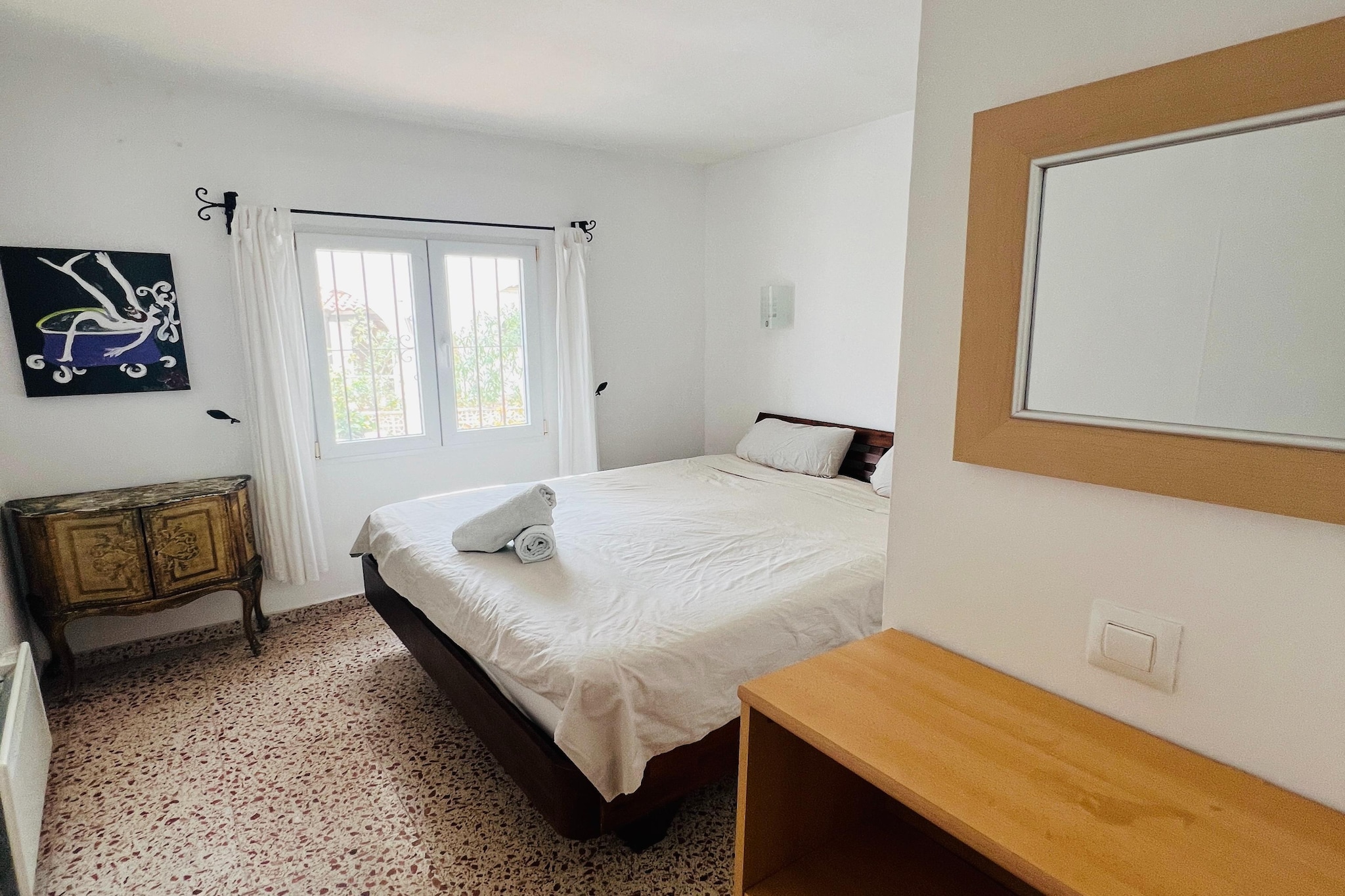 On the 1st floor: (Kitchen(hob(5 ring stoves), oven, combination microwave, dishwasher, fridge-freezer), Living/diningroom(TV(smart TV), dining table(6 persons), fireplace, seating area, wireless music system, chromecast, netflix), bedroom(double king size bed(185 x 200 cm), heating(electric), air conditioning, insect screens), bedroom(single bed(90 x 200 cm), single bed(90 x 200 cm), heating, air conditioning, insect screens), bathroom(shower, washbasin, toilet), garage, Parking, dining table(6 persons), heating, air conditioning, terrace(roofed), garden furniture, sun loungers, BBQ(gas), swimming pool(private,  8 x  4 m.), ironing board, plancha grill, Mountain view, Sea view)\n\ncarport, shower(outside), washing machine, terrace, garden, garden furniture, sun loungers, swimming pool(private,  8 x  4 m.), ironing board, party games