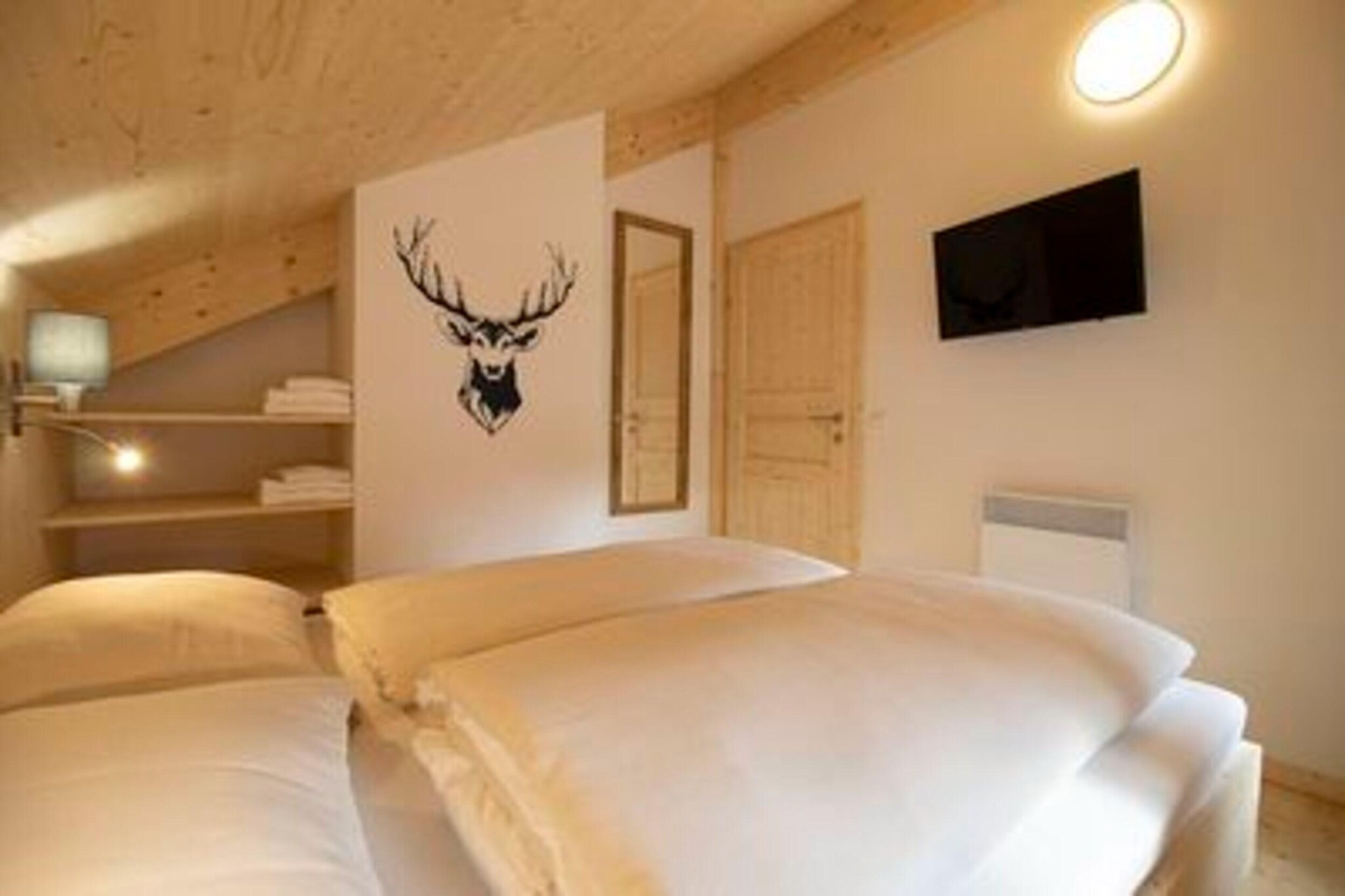 "Experience a blend of comfort and luxury in our exclusive chalet, perfectly designed for up to 5 guests across 70mÂ² of elegant living space. Ideally located at Kreischberg, just 250 meters from the ski slope, this chalet offers an exceptional retreat for your alpine adventures. 

 The chalet features two well-appointed bedrooms: one with a double bed and another with two single beds, providing flexible sleeping arrangements. The bathroom includes a shower and toilet, with a hairdryer available for your convenience. Relax in the spacious living-dining area, which boasts a cozy seating arrangement and a flat-screen TV for your entertainment. The open kitchen is fully equipped with cutlery, cookware, a ceramic hob, oven, dishwasher, and a fridge with a freezer compartment. Additional appliances, including a toaster, kettle, and coffee machine, ensure that all your culinary needs are met. Upon arrival, you will find a small starter kit with essential cleaning supplies and dishwashing items to help you settle in comfortably. 

Enhance your relaxation with the chaletâ€™s infrared sauna, designed to provide a soothing retreat after a day on the slopes. The garden area features a table tennis table, offering a fun outdoor activity for guests. Complimentary Wi-Fi and satellite TV are provided, keeping you connected and entertained throughout your stay.  

 As a special benefit, your stay includes the Murau-Murtal GuestCard for summer activities, which provides additional perks and discounts on local attractions.  "