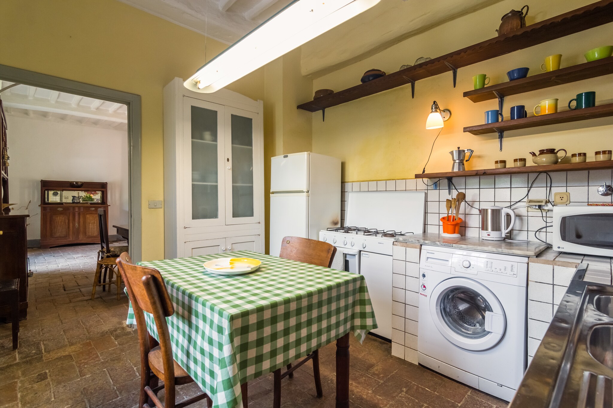 Ground floor: (Living room(dining table, fireplace), Kitchen, Bedroom with bathroom(double bed, bath tub), bathroom(shower, washbasin, toilet, bidet), washing machine)\n\nOn the 1st floor: (bedroom(double bed))\n\nterrace, garden(shared with other guests), garden furniture, swimming pool(shared with other guests,  9 x  6 m., opened from Jun upto and including Sep)