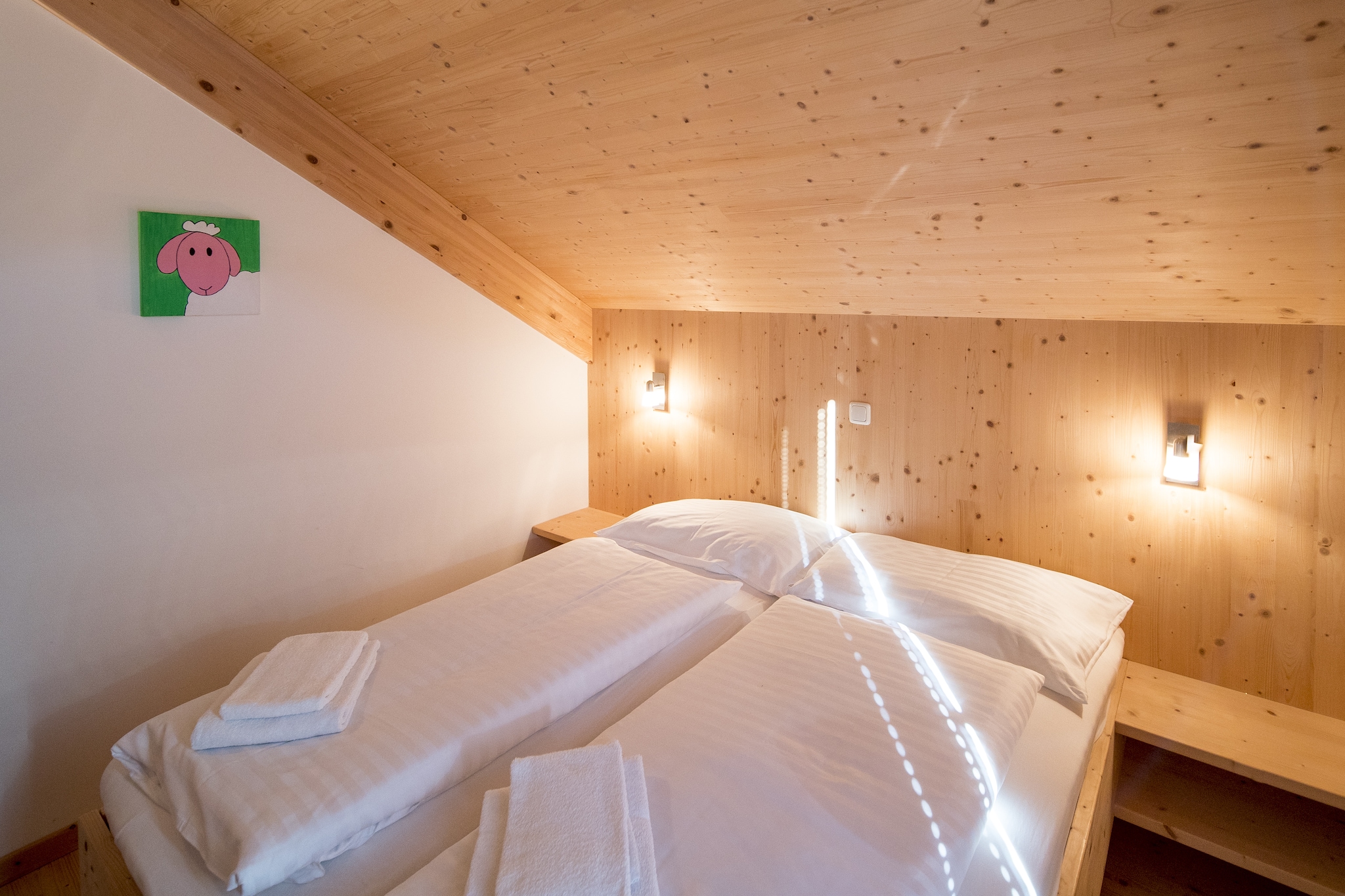 Experience comfort and relaxation in this generous 100 m² chalet, perfectly designed to accommodate up to 8 guests. Spread across two floors, the chalet features four well-appointed bedrooms, including one partially open walk-through room. You'll find restful slumber in the cozy double beds, with an additional single bed in one of the rooms to ensure everyone has a place to unwind.  Relax and rejuvenate in your private infrared sauna, the perfect retreat after a day of adventure. Free Wi-Fi is available throughout the chalet, and a washing machine is also provided for your convenience. 

Located in the picturesque Murau-Murtal region of Styria, the chalet is just 5 km from the Kreischberg gondola lift. Your stay includes the MurauCard (summer), offering additional perks and local benefits. 

The chalet includes two modern bathrooms, each equipped with a WC, an adventure shower, and an indoor whirlpool tub (hairdryer provided).  On the ground floor, you'll discover a spacious living area and a fully equipped kitchen that opens onto a charming terrace. The kitchen is a chef’s delight, featuring cutlery, cookware, an oven, a partial microwave, a fridge with a freezer compartment, and a dishwasher. Additional amenities include a toaster, kettle, and filter coffee machine. To kickstart your stay, a small starter set with a dishwasher tab, dishwashing detergent (sample), sponge, garbage bag, cleaning supplies, and a tea towel will be provided upon arrival. 

Discover the ideal blend of comfort and luxury in this charming chalet, where every detail is designed to make your stay memorable.