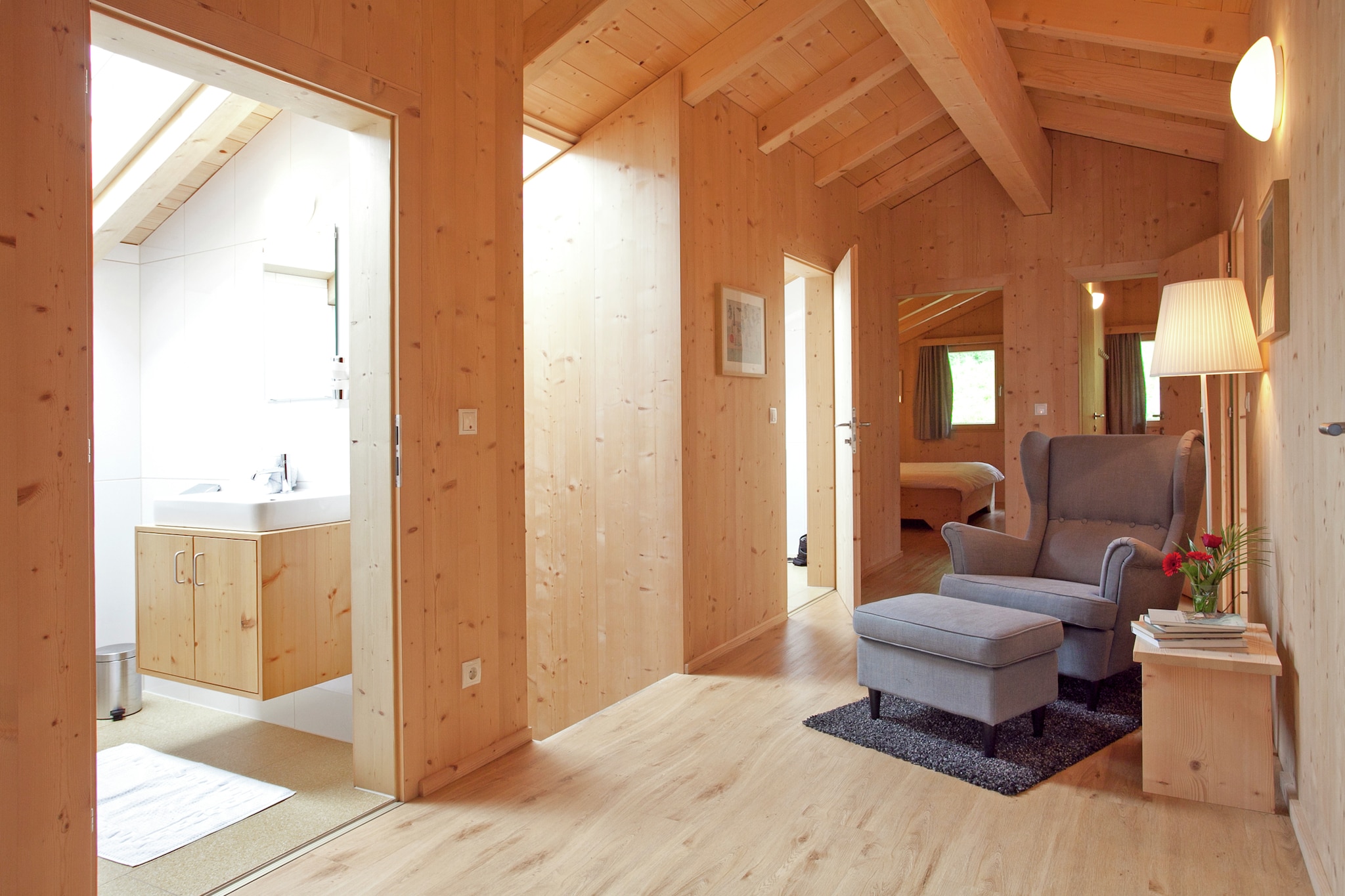 Ground floor: (Entrance(6x garage, parking), ski storage(ski boot heaters))\n\nOn the 1st floor: (Living room(TV(satellite), radio), Sitting room(TV), open kitchen(cooker(ceramic), coffee machine, oven, microwave, dishwasher, fridge-freezer), bedroom(2x bunk bed), bedroom(double bed), bedroom(double bed), bathroom(shower, washbasin, toilet), toilet(washbasin, toilet))\n\nOn the 2nd floor: (bedroom(bunk bed), bedroom(double bed), bedroom(double bed), bedroom(double bed), bedroom(2x single bed), bathroom(shower, washbasin, toilet), bathroom(shower, washbasin, toilet))\n\n6x garage, infrared sauna, heating(floor heating), terrace, garden, garden furniture, BBQ, parking, children\'s bed, 2x high chair