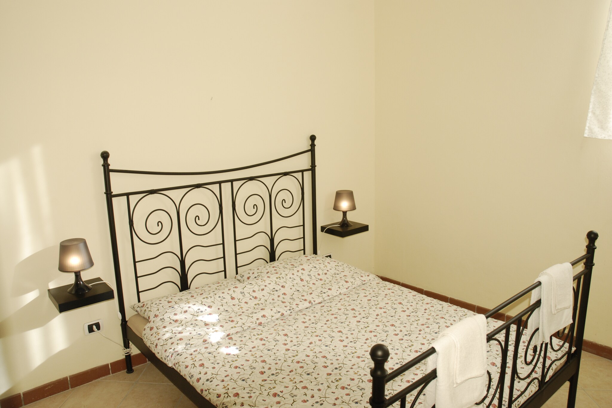 Ground floor: (Living room(double sofa bed, TV, fireplace), open kitchen, bedroom(2x single bed), bedroom(double bed), bathroom(shower, washbasin, toilet, bidet, washing machine), bathroom(shower, washbasin, toilet, bidet))\n\ngarden furniture, parking