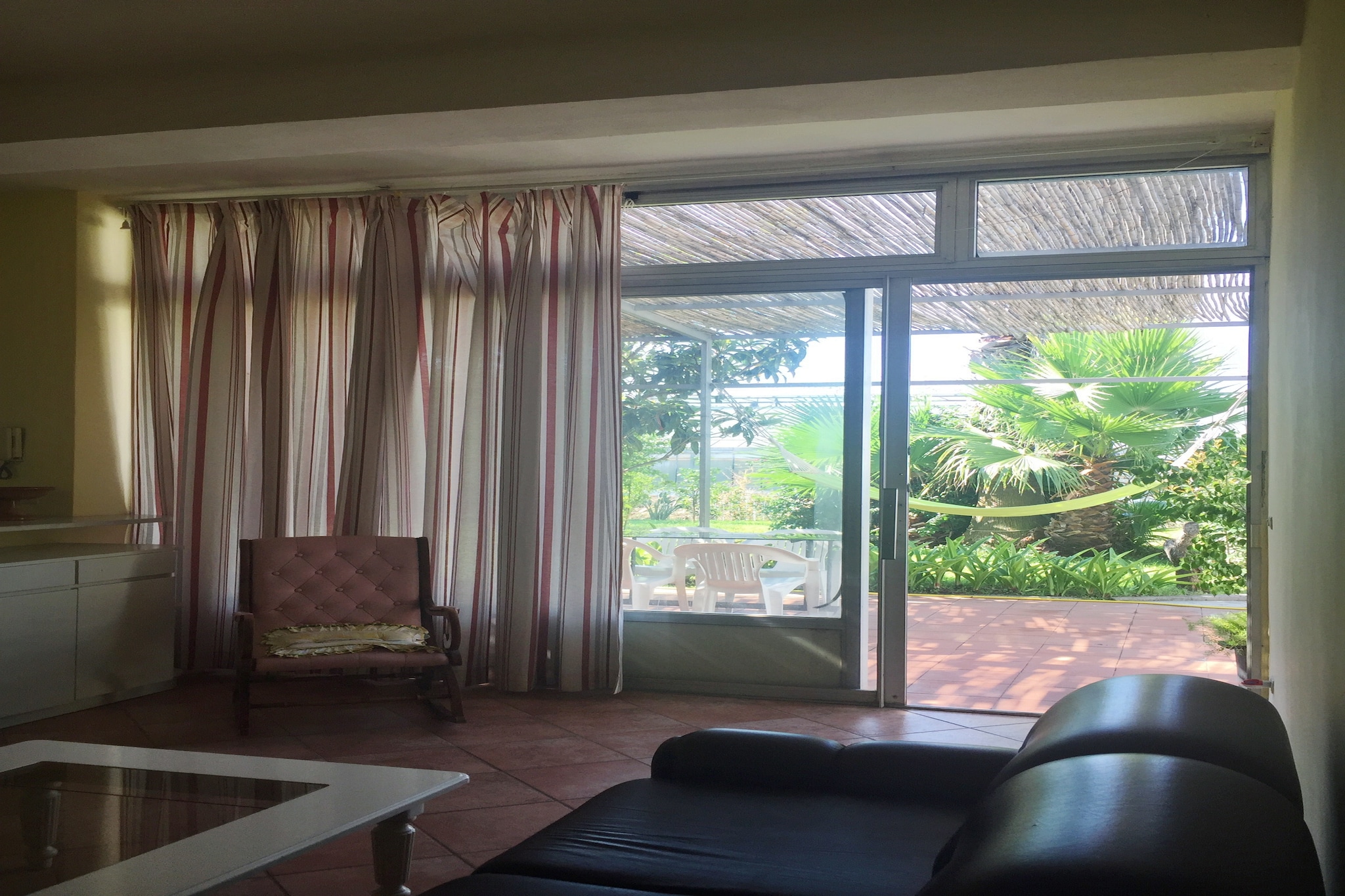 Stay at the foot of the Mt. Vesuvius, a famous attraction of Italy. The apartment lies in Trecase in Naples, and ideal for a family or group of 4. This two-bedroom apartment offers a colourful garden with seating, to enjoy your morning coffee with breath taking views of the mountains and valley. 

 The apartment lies just a km away from the town centre of Trecase where you can find various restaurants and bars as well as places to shop. The sea beach which is the hub of all activities, is only 1.5 km away. 

 The bedrooms adorn simple dÃ©cor for a homely feel and equipped with a double or two single beds, attached bathroom with shower and wardrobes. The rooms are completely light filled and welcoming. Enjoy a relaxing time in the living room, fully furnished with sofa, TV and a cosy fireplace for cold evenings. You get free parking onsite. 

 Naples international airport is just 20 minutesâ€™ drive away!