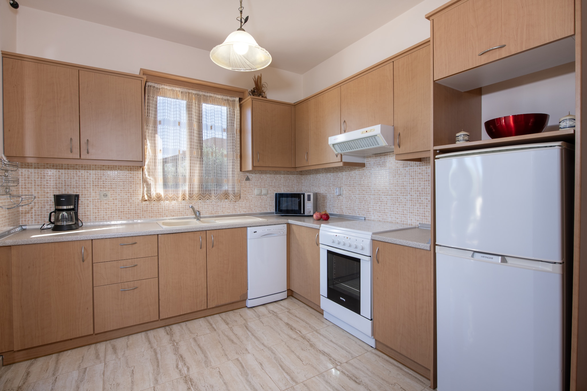 Ground floor: (Living room(2x single sofa bed, TV(satellite), air conditioning), open kitchen(cooker(ceramic), oven, dishwasher, fridge-freezer), bedroom(double bed, air conditioning), bedroom(2x single bed, air conditioning), bathroom(bathtub with shower, Bubble bath, washbasin, toilet), terrace)\n\nwashing machine, garden(shared with other guests, fenced), garden furniture, sun loungers, BBQ, parking, parasol, swimming pool(shared with other guests, 6 x 4 m.), children\'s bed, high chair