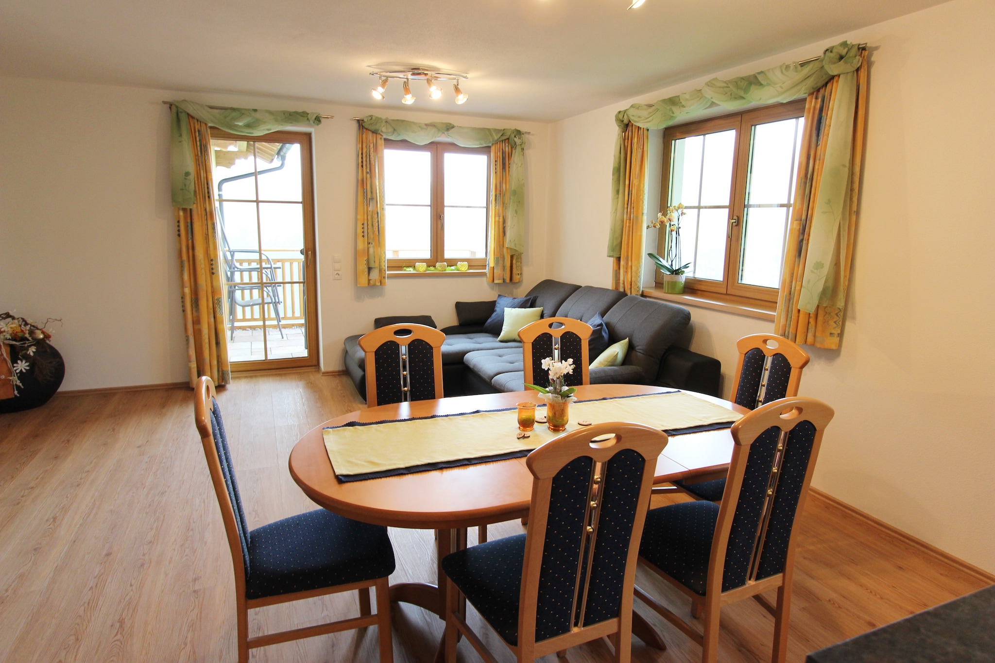 Ground floor: (open kitchen(electric kettle, cooker(4 ring stoves, ceramic), hood, coffee machine(filter), oven, microwave, dishwasher, fridge-freezer), Living/diningroom(TV(flatscreen), dining table, seating area), bedroom(double bed(180 x 200 cm), bunk bed(90 x 200 cm)), bedroom(double bed(180 x 200 cm), bunk bed(90 x 200 cm)), bathroom(shower, washbasin, washing machine), toilet(washbasin, toilet), balcony)\n\nheating(central), terrace, garden, parking, play equipment, children\'s bed, high chair