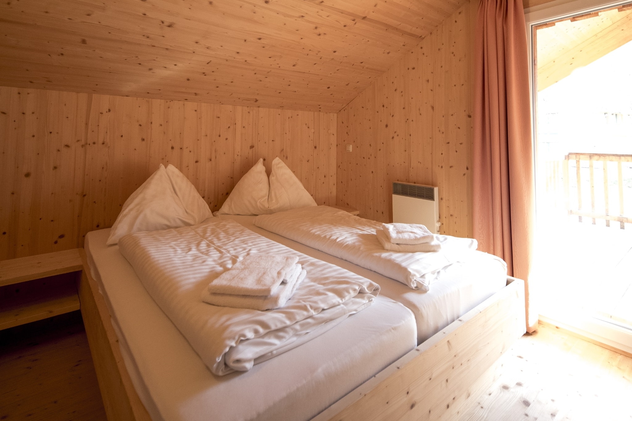 Ground floor: (Living room(TV(satellite), gas fireplace), open kitchen(electric kettle, toaster, coffee machine(filter), oven, microwave, dishwasher, fridge-freezer, dishes and cutlery), Internet access)\n\nOn the 1st floor: (bedroom(double bed), bedroom(double bed), bedroom(bunk bed), bathroom(shower, infrared sauna, washbasin, toilet, hairdryer))\n\ngrill, cot, heating(electric, central), terrace, garden furniture, parking, high chair