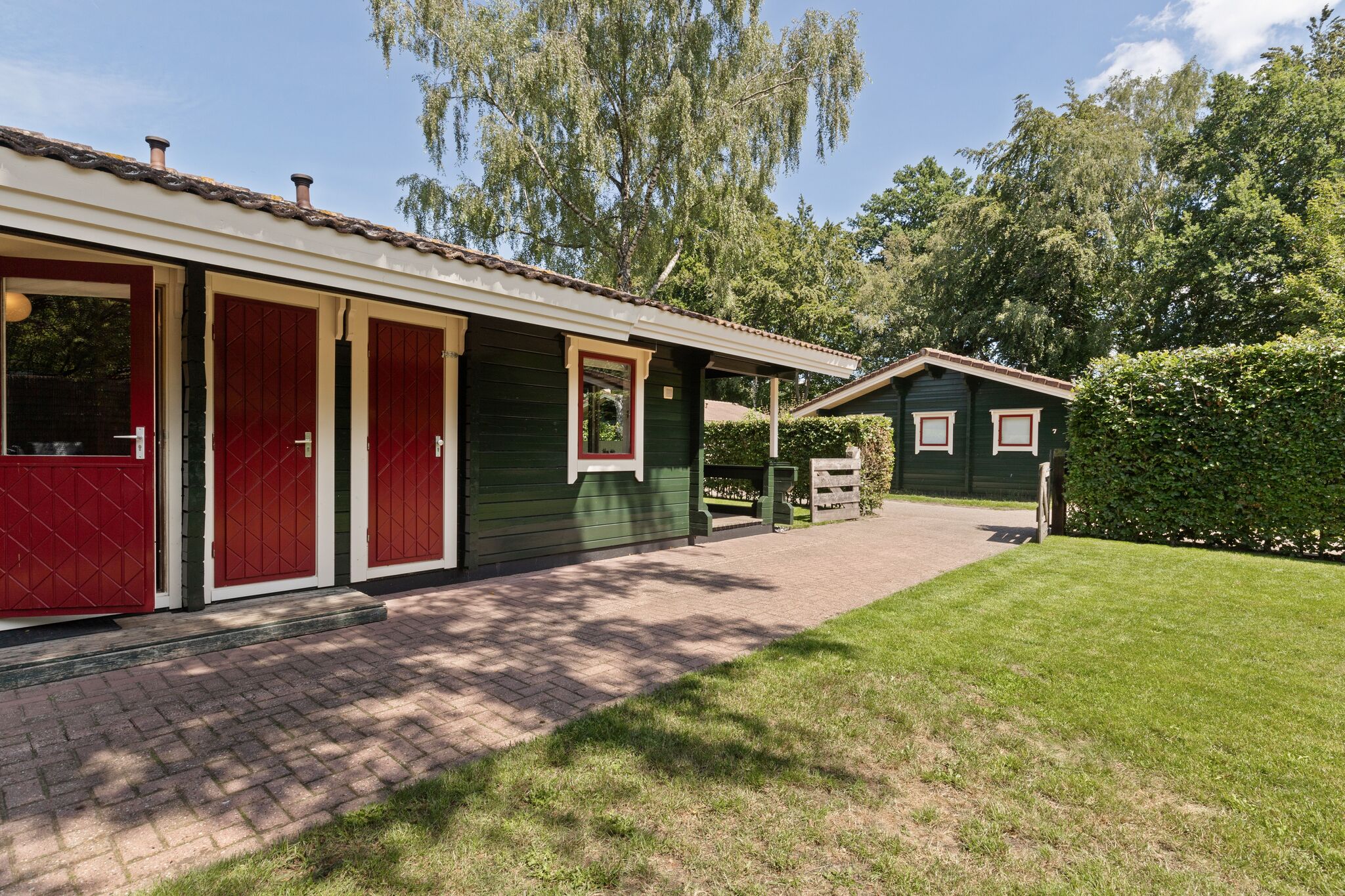 Vrijstaande bungalow in de Veluwe met een omheinde tuin