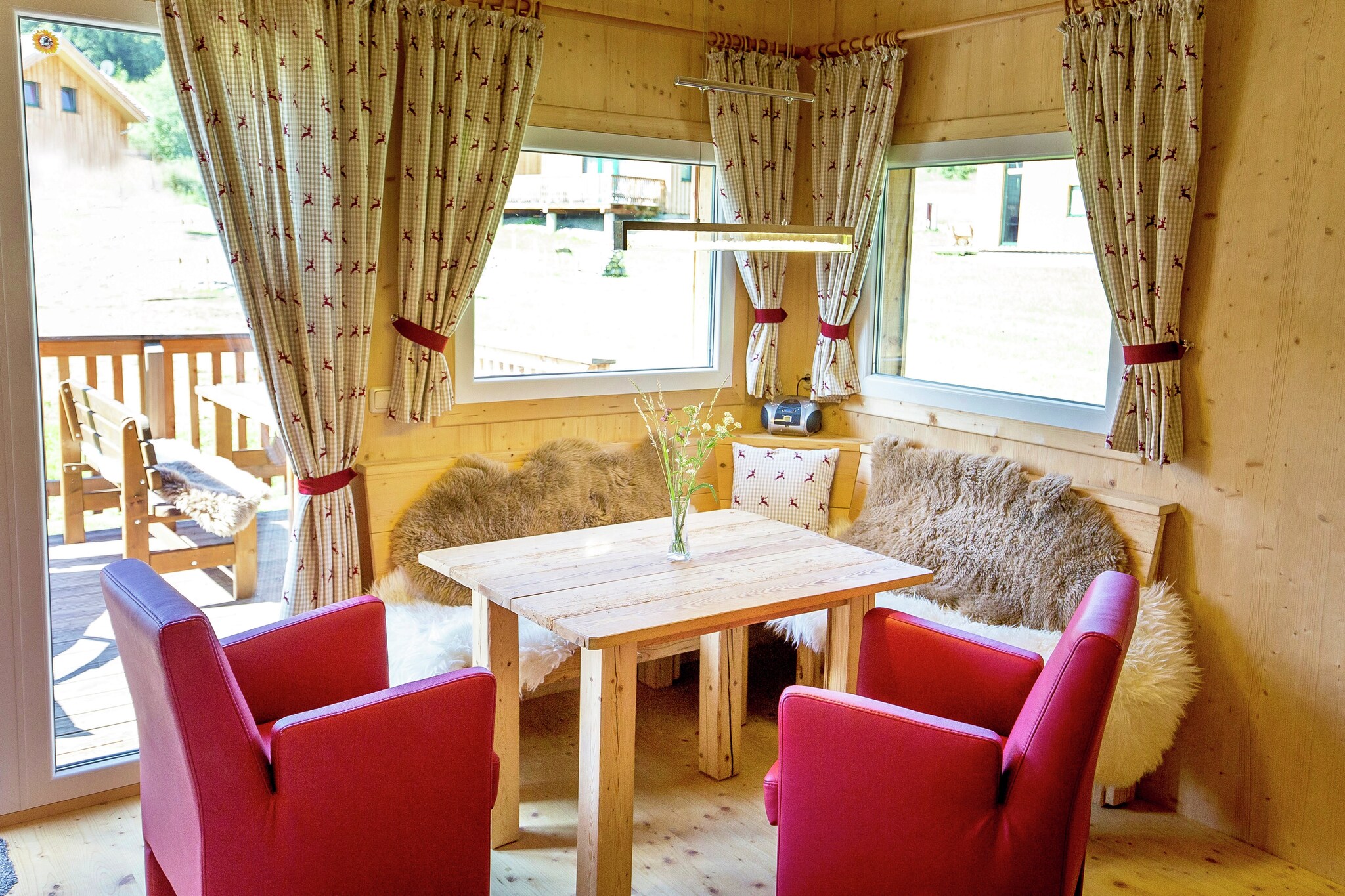 Ground floor: (Living room(TV(satellite), gas fireplace), open kitchen(electric kettle, toaster, cooker(ceramic), coffee machine(espresso, filter), oven, microwave, dishwasher, fridge-freezer, dishes and cutlery(Bowls, chopsticks, plates, cups, etc.)), Internet access)\n\nOn the 1st floor: (bedroom(double bed), bedroom(single bed, double bed), bathroom(Bubble bath, shower, infrared sauna, washbasin, toilet, hairdryer))\n\nstorage, cot, washing machine, ski boot heaters, heating(electric, central), terrace, garden, garden furniture, BBQ(gas), parking, children\'s bed, high chair