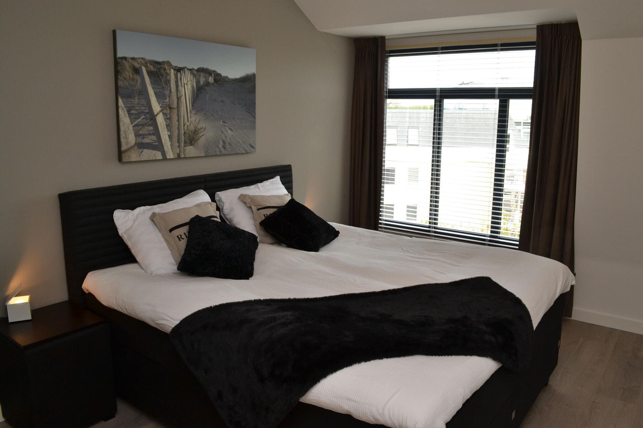 Luxe appartement met airco en wasmachine, in een residentie op 200 m. van zee