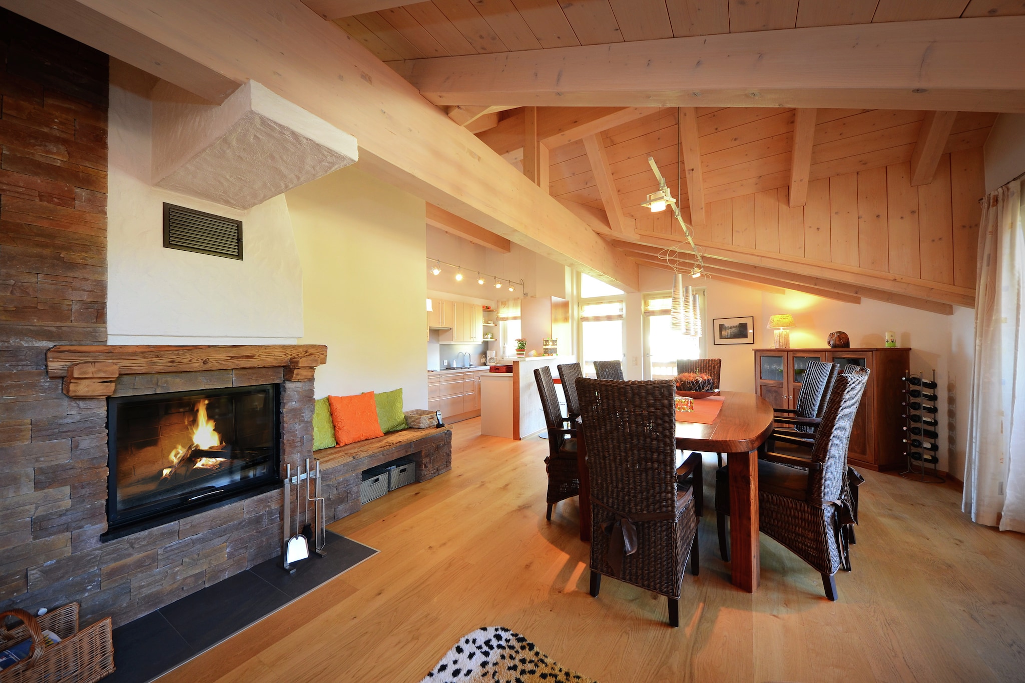 On the 2nd floor: (Living room(TV, stove(wood), balcony), open kitchen(cooker(ceramic), oven, dishwasher, fridge-freezer), bedroom(double sofa bed, bunk bed, balcony), bedroom(double bed, balcony), bedroom(double bed, balcony), bedroom(double bed, balcony), bathroom(bath tub, shower, 2x washbasin), bathroom(bath tub, shower, washbasin), toilet, toilet)\n\nski storage(ski boot heaters), garage, heating(central, floor heating), parking, lift, children\'s bed(on request), high chair(on request)