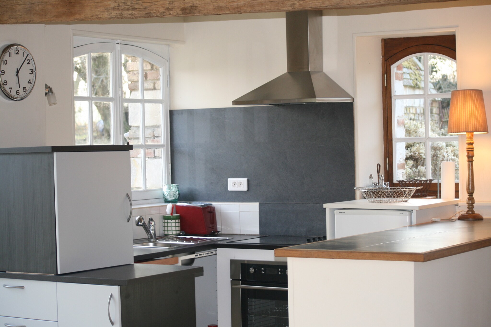 Ground floor: (open kitchen(electric kettle, toaster, coffee machine(filter), coffee machine(cups), oven, microwave, dishwasher), Living/diningroom(TV, stove(wood), seating area), toilet)\n\nOn the 1st floor: (bedroom(double bed(180 x 200 cm), washbasin), bedroom(single bed(80 x 190 cm), double bed(160 x 200 cm), washbasin), bathroom(bath tub, shower, washbasin))\n\nwashing machine, heating, terrace, garden(private, fenced), garden furniture, BBQ, parking, children\'s bed, high chair