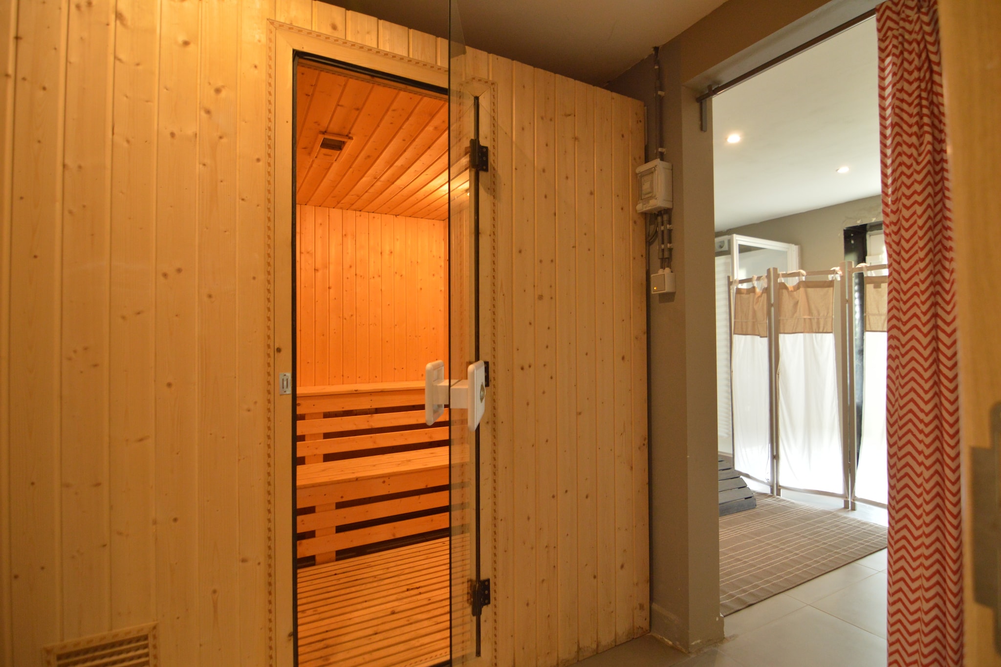 An optional utilities and service fee of EUR 230,00 will be charged before your arrival. Details are given below.<br> Tucked in the scenic village of Francorchamps, just minutes from the legendary Spa-Francorchamps F1 circuit, this modern 6-bedroom holiday home is perfect for families or groups of friends. Surrounded by the Ardennes forest, it offers a serene retreat with stylish interiors, spacious living areas, and a range of amenities for all ages. Relax in the private sauna, soak up the sun on the furnished terrace, or gather around the pellet stove. The basement game room features billiards, foosball, table tennis, and a gaming console, while a fitness room and trampoline in the fenced garden provide active fun. The villa combines comfort and entertainment, making it ideal for both relaxation and socializing. <br><b> Optional Utilities & Service Package </b><br><b> An optional utilities and service package of EUR 230,00 </b> can be selected prior to your arrival. You will receive a separate communication with the payment link should you wish to include it.<br>This package ensures a seamless stay and conveniently covers services such as final cleaning, utility consumption, service support, and protection against minor damages or incidental costs during your stay.<br>Guests who prefer may manage these services independently, provided the property is returned in good order at check-out.