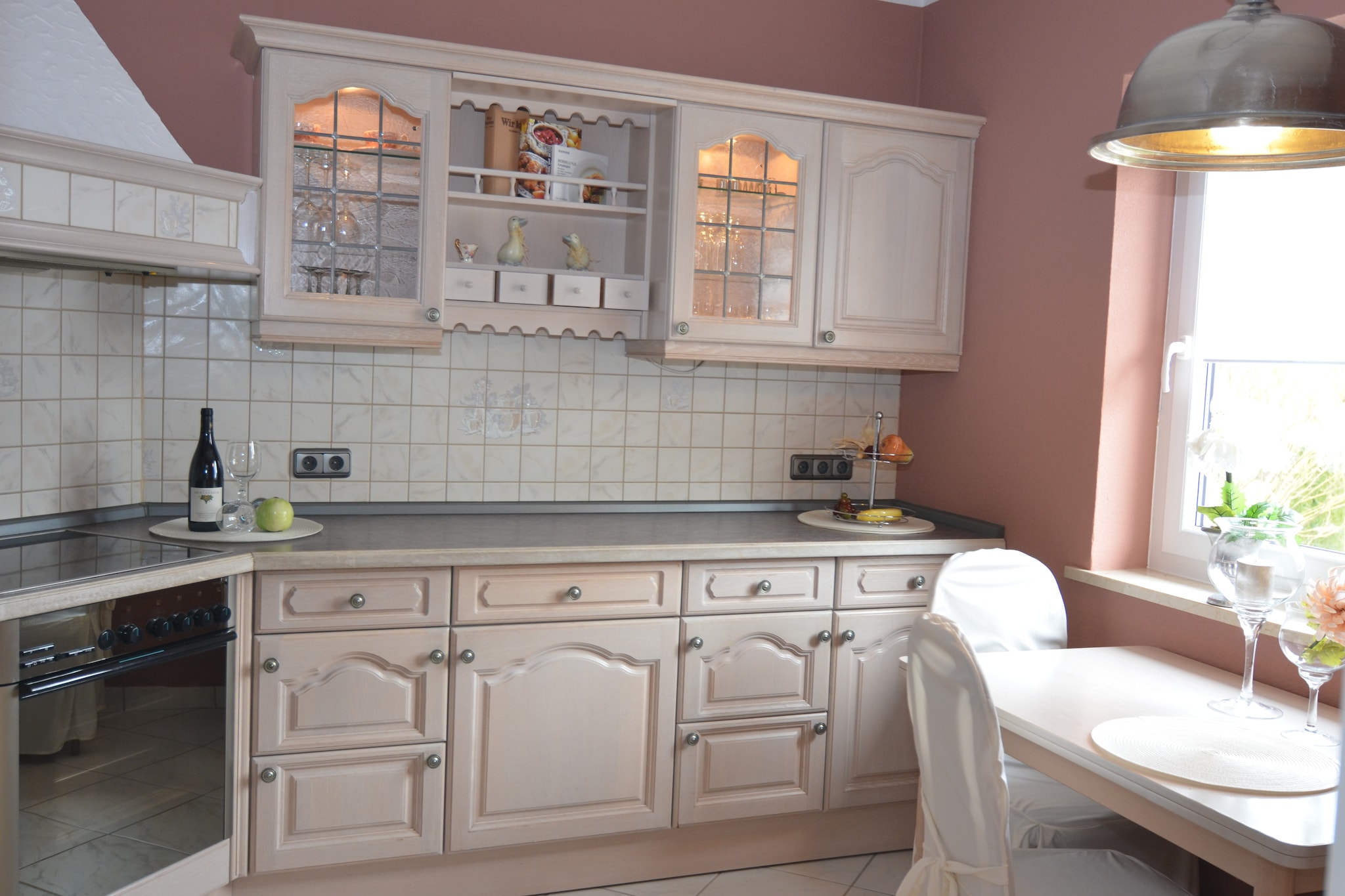 On the 1st floor: (Entrance, Kitchen(cooker(ceramic), oven, microwave, dishwasher), Living/diningroom(TV(satellite), dining table, stove(Pellet)), bedroom(double bed), bathroom(shower, washbasin, toilet), Landing)\n\ncoffee machine, grill, Bubble bath(outside), hot tub, sauna, balcony, heating, garden, garden furniture, parking, parasol, ironing board, Charging post for electric cars