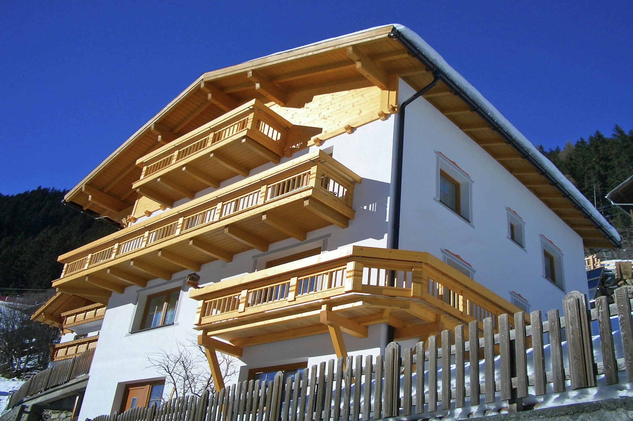 On the 1st floor: (Large kitchen(TV(satellite), dining table, electric kettle, toaster, oven, microwave, dishwasher, fridge-freezer), bedroom(double bed, shower(unit), washbasin), bedroom(double bed, shower(unit), washbasin), bedroom(double bed, shower(unit), washbasin), toilet, toilet, Landing)\n\nbalcony, heating(central), parking