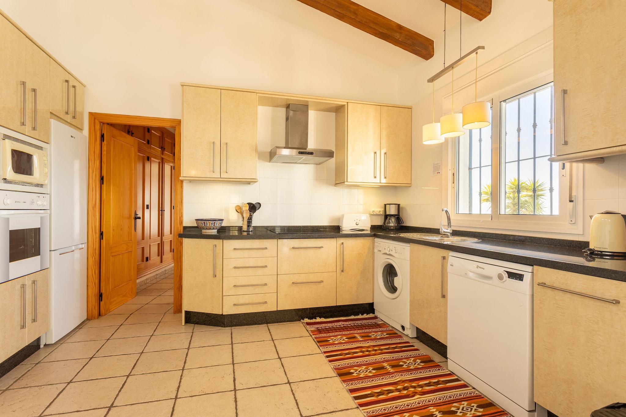 Ground floor: (Kitchen(electric kettle, toaster, cooker, coffee machine, oven, microwave, dishwasher, fridge-freezer), Living/diningroom(double sofa bed, TV(international television channels), dining table, fireplace, CD player, air conditioning), bedroom(double bed), bedroom(double sofa bed), Bedroom with bathroom(double bed, shower, washbasin, toilet, terrace), bathroom(bathtub with shower, washbasin, toilet), washing machine, heating(electric))\n\noutdoor kitchen, heating(electric, gas), terrace(roofed), garden furniture, sun loungers, BBQ, parking, swimming pool(private,  8 x  4 m., opened from Jan upto and including Dec), children\'s bed, high chair