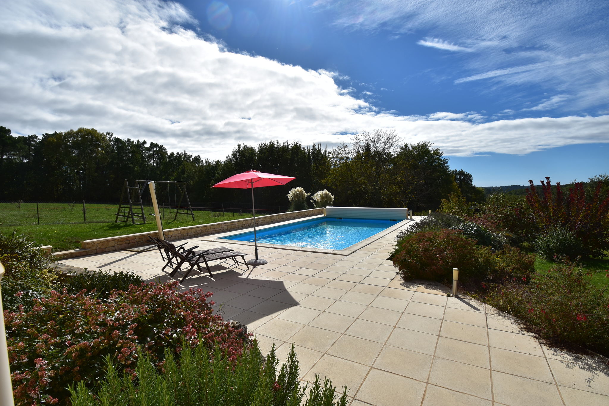 Holiday home in Montcléra with sunny garden, playground equipment and private pool