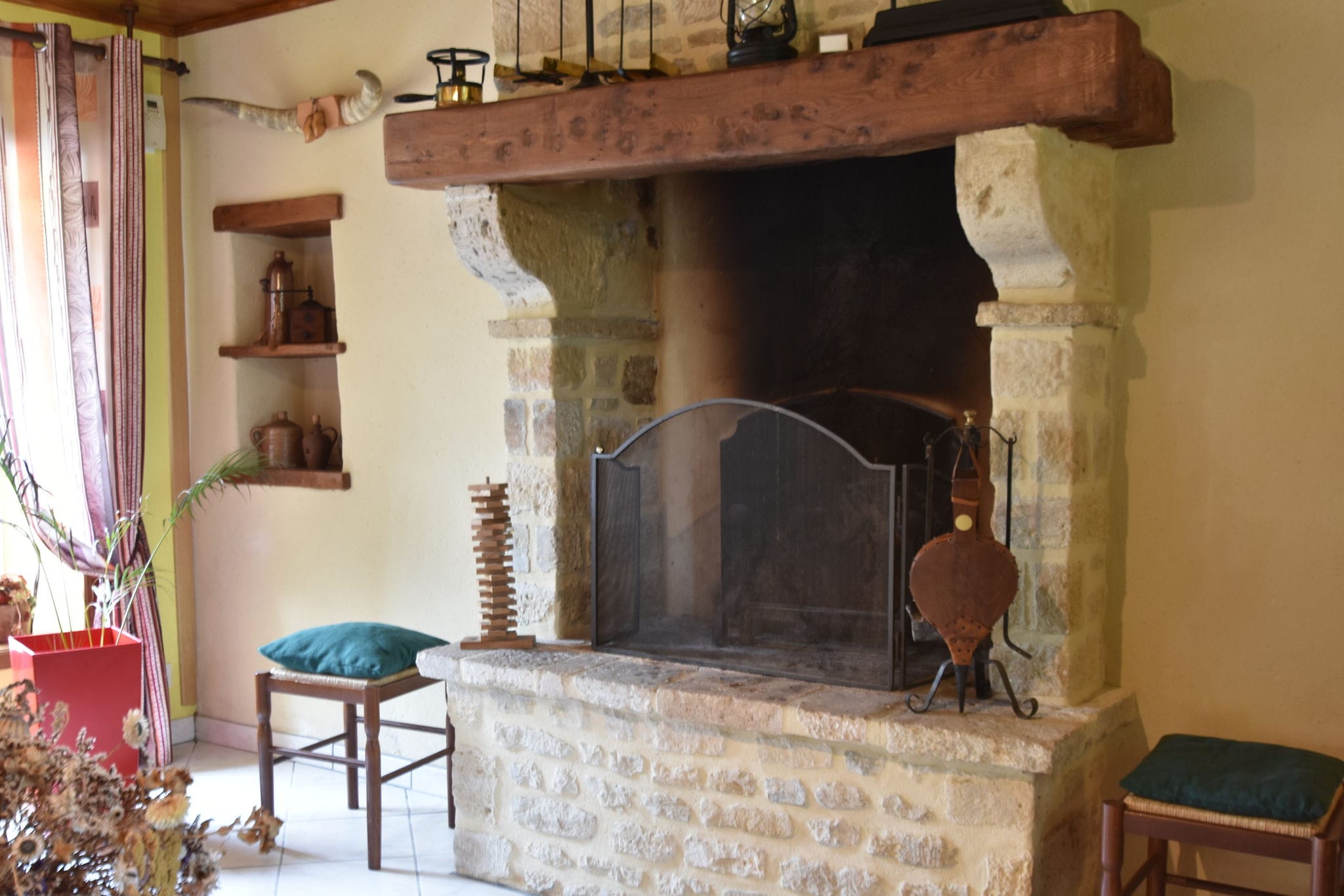 Maison de vacances cosy avec cheminée à Gourbesville