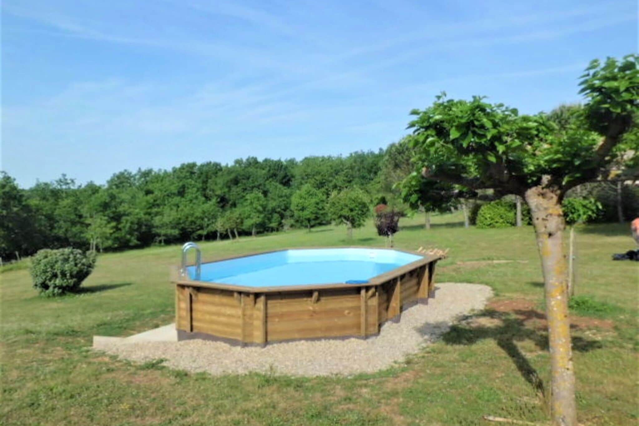 Maison de vacances confortable avec piscine à Thédirac
