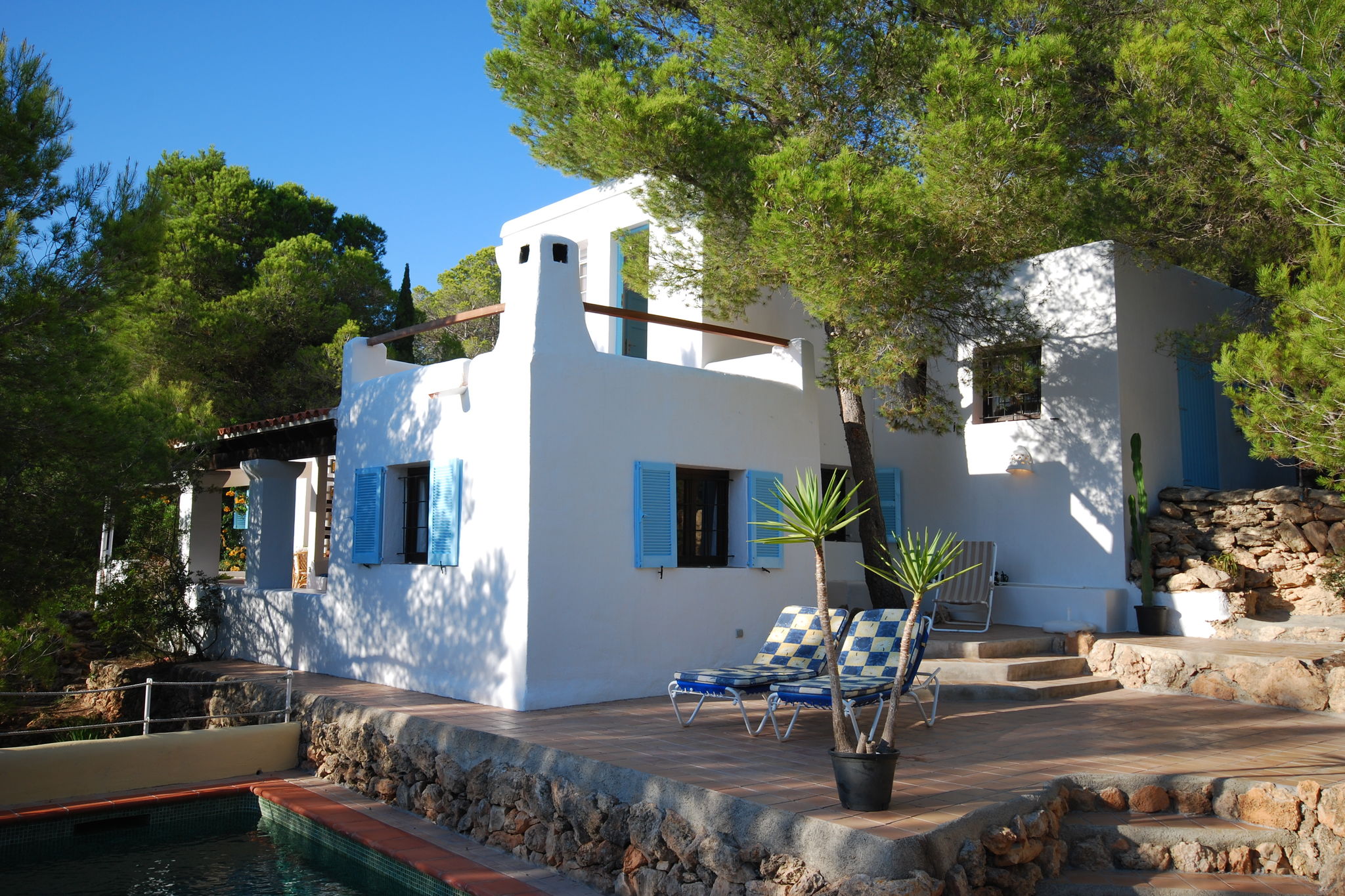 Holiday in Ibiza, nestled between green with private pool