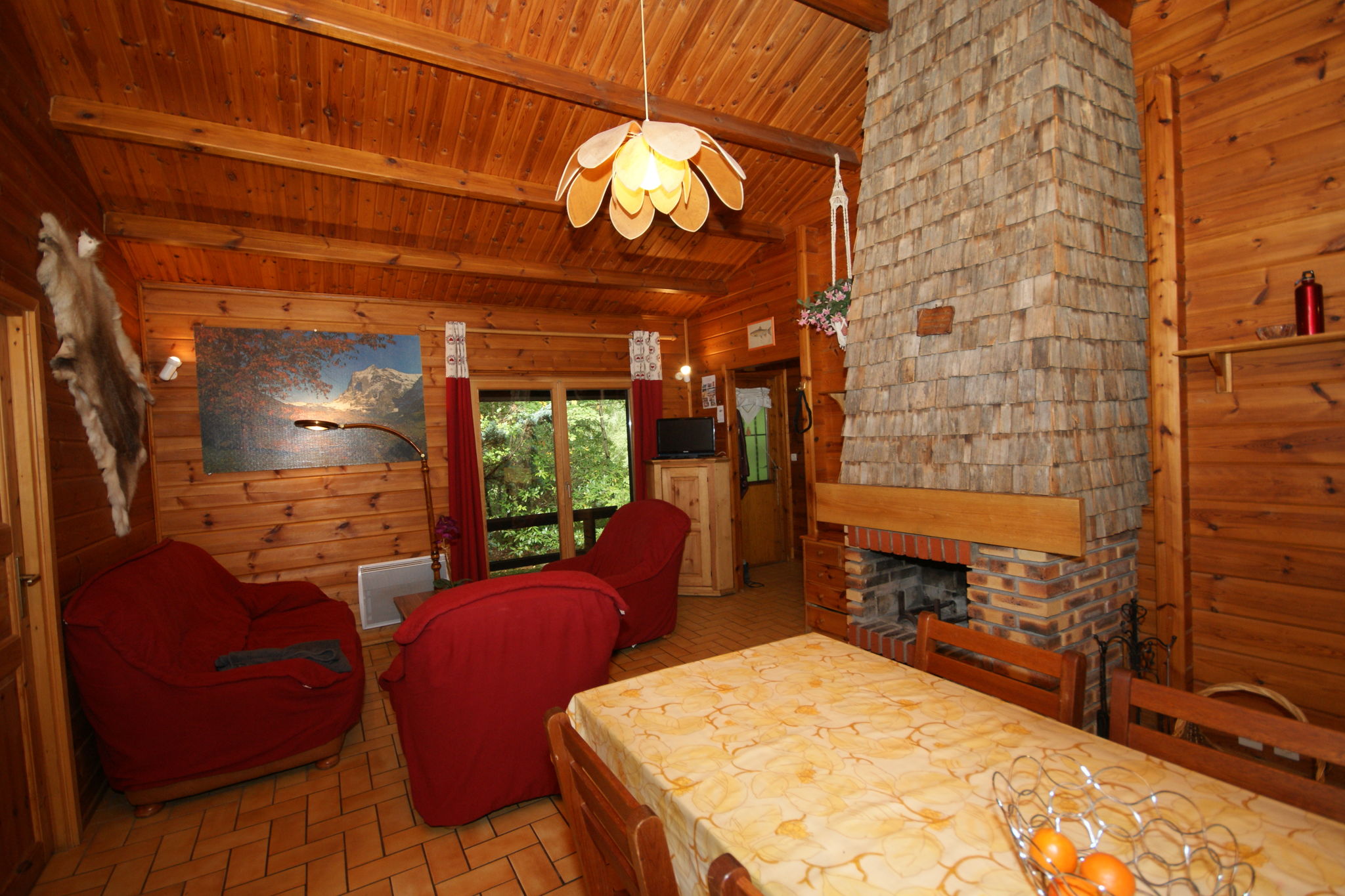 Wooden, quietly-located chalet with garden on the edge of the forest in the French countryside