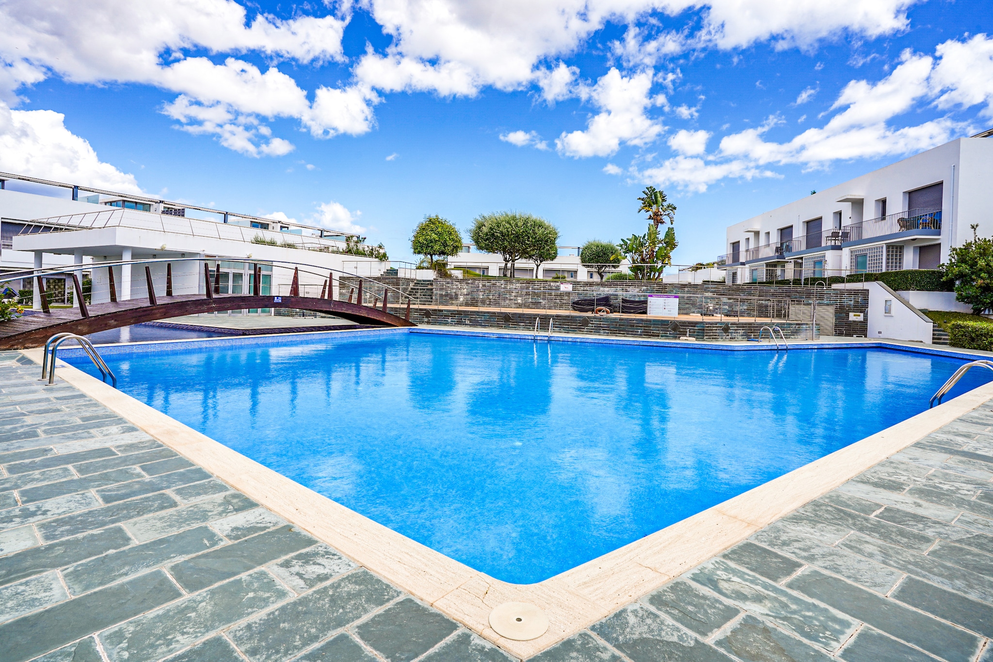 Sophisticated yet stylish, this apartment in Tavira has 2 bedrooms to accommodate 4 people. This property is ideal for a small family and features a shared pool and private terrace with barbecue.

Have meals at the restaurants located just 400 m away from the apartment or buy your daily essentials at supermarket, 1 km away. The whiff of fresh sea air can be felt 2 km from the apartment. If you fancy knocking a ball about, then this apartment is just 3 km away from the golf course. The tennis court is 7 km away. 

With modern interiors, this apartment with free WiFi has a well-equipped kitchen with microwave and coffee machine. There is a shared pool and terrace in this air-conditioned property. A few luxuries like private terrace with barbecue is sure to please you. Parking is on-site. Cot and high chair is available for a small fee. For reasons of tranquillity, this holiday home will not be rented to groups of youngsters.

