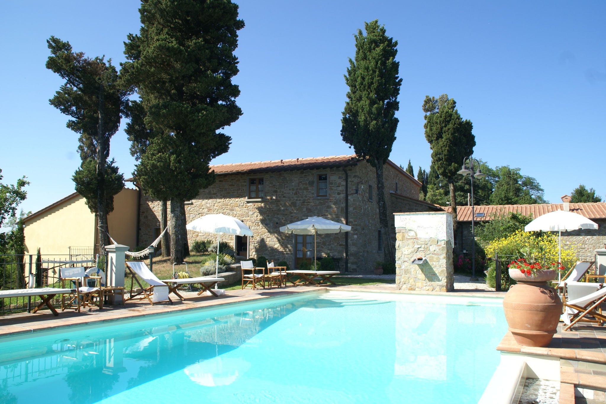 Charming apartment in an old farmhouse with swimming pool in a beautiful setting
