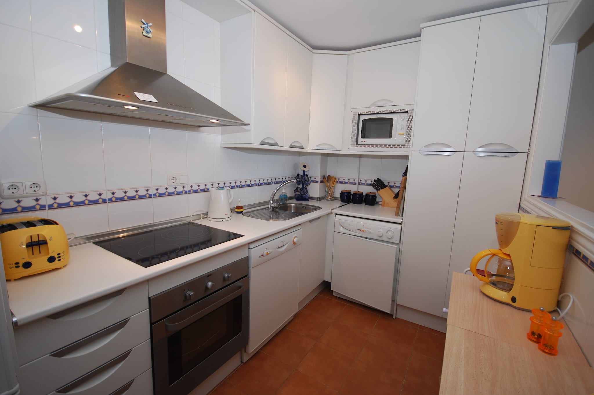 On the 1st floor: (Kitchen(toaster, cooker, hood, coffee machine, oven, microwave, dishwasher, fridge-freezer), Living/diningroom(double sofa bed, TV(international television channels), dining table, CD player), Bedroom with bathroom(double bed, bathtub with shower, 2x washbasin, toilet), Bedroom with bathroom(double bed, shower, washbasin, toilet), washing machine, balcony, air conditioning, garden furniture)\n\ngarage, garden(shared with other guests), swimming pool(shared with other guests, 16 x  5 m., opened from Jan upto and including Dec), children\'s bed, high chair