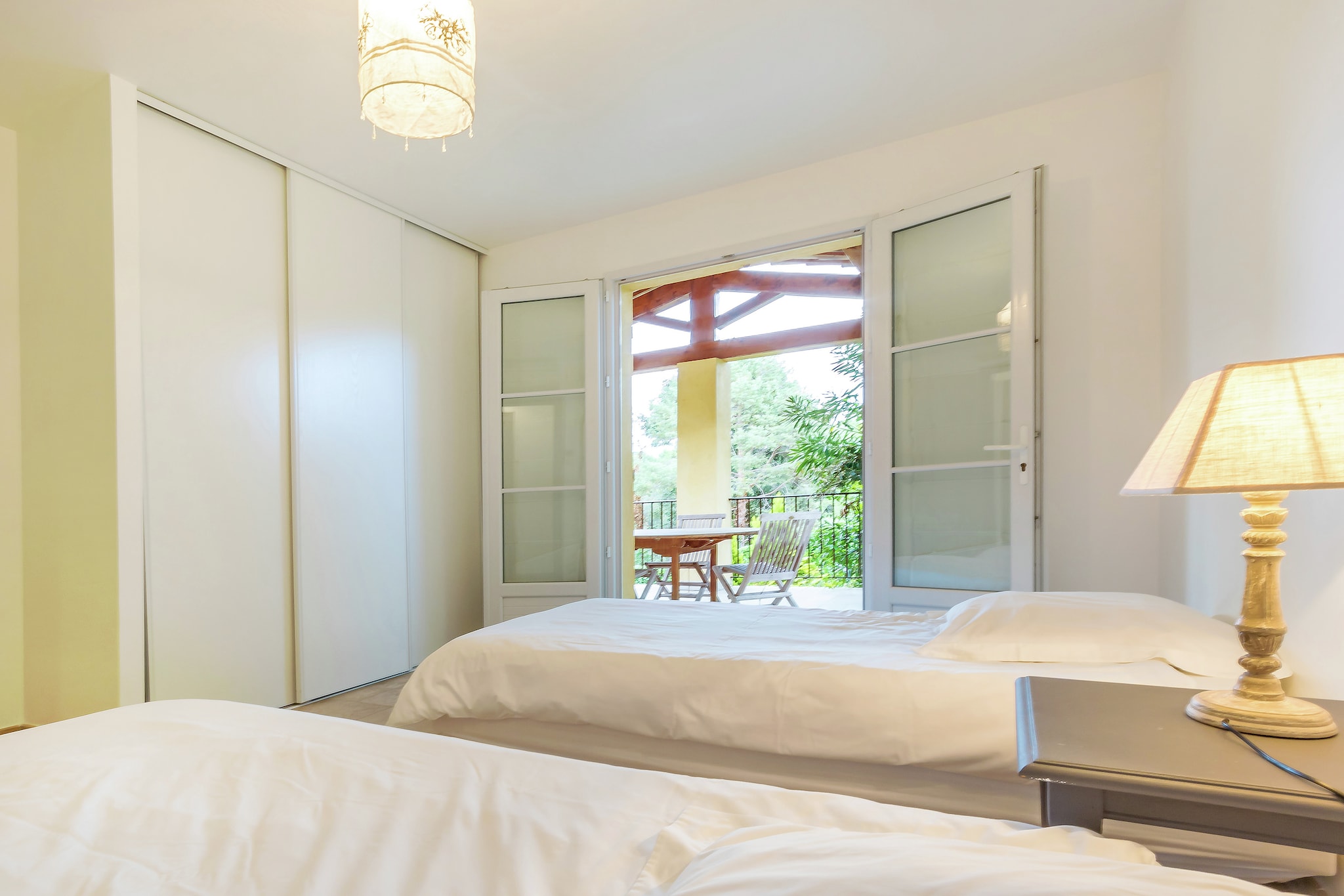 Ground floor: (Living room(double sofa bed, TV(satellite, International television channels, No Dutch television channels), DVD player), open kitchen(oven, dishwasher, fridge-freezer), bedroom(2x single bed), bathroom(shower), toilet)\n\nfreezer, tumble dryer(shared with other guests), washing machine(shared with other guests), heating, air conditioning, terrace(private, roofed), garden, garden furniture, BBQ, swimming pool(shared with other guests), children\'s bed, high chair