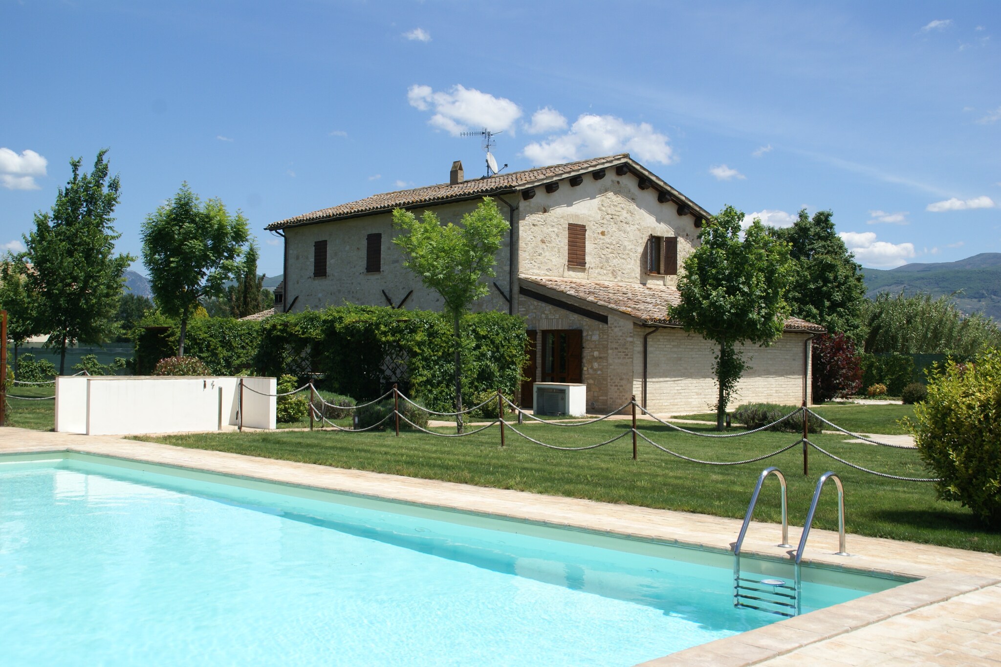 Located in the lively town of Foligno, this is a 1-bedroom holiday home. The holiday home has a fenced garden with a swimming pool for some exotic fun. It is perfect for a couple or 2 friends on an adventurous expedition. 



The roads in the area are suitable for biking and take you to every place to want to explore. You have many must-see historic buildings, quaint shops, and local restaurants in Foligno. At 1.5 km, you have the nearest restaurants and supermarkets. Sports lovers have a tennis court at 3 km and a golf course at 25 km to be active. For a day-tour, the charming town of Montefalco is 9 km.



The holiday home is air-conditioned and has a double sofa bed in the living room to relax, lounge or read a book in silence. Explore your culinary skills in the open kitchen and enjoy them on the roofed terrace. In the evenings, you can linger outdoors around the barbecue with some refreshing cool drinks. The fresh air in the shared garden is great to relax.