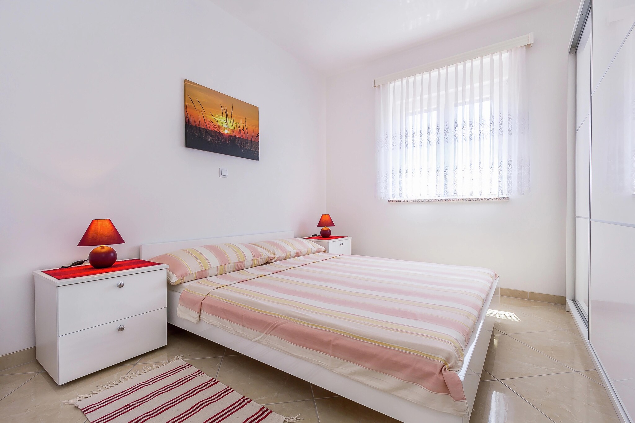 On the 2nd floor: (Living room(single sofa bed, TV(satellite), balcony, air conditioning), Large kitchen(oven, fridge, fridge-freezer), bedroom(double bed(160 x 200 cm)), bedroom(double sofa bed), bathroom(shower, toilet))\n\ngarden(shared with other guests )