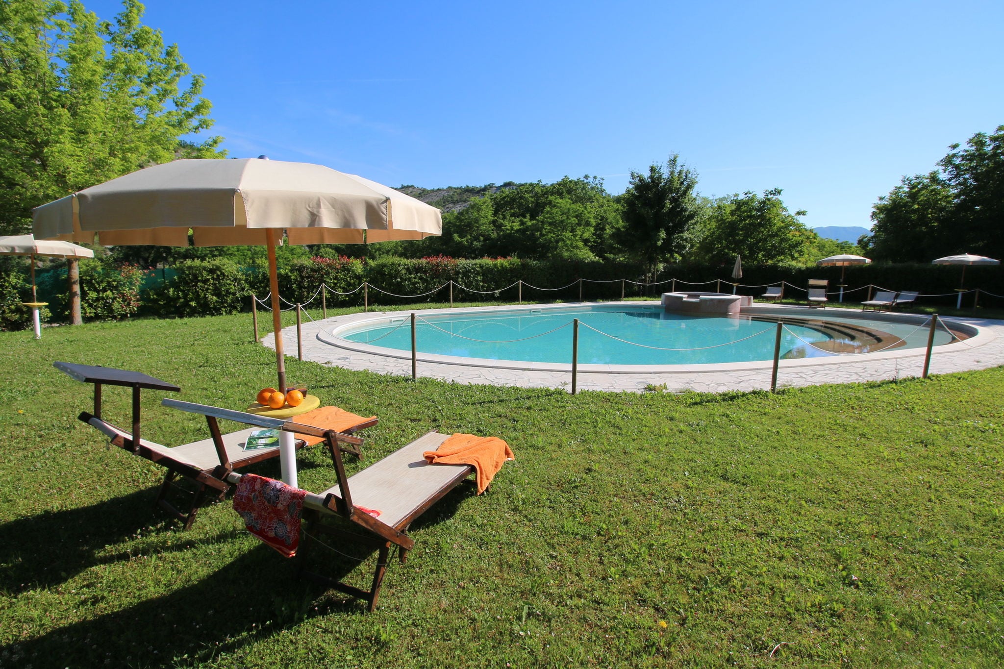 Property with swimming pool, spacious garden, private terrace and views