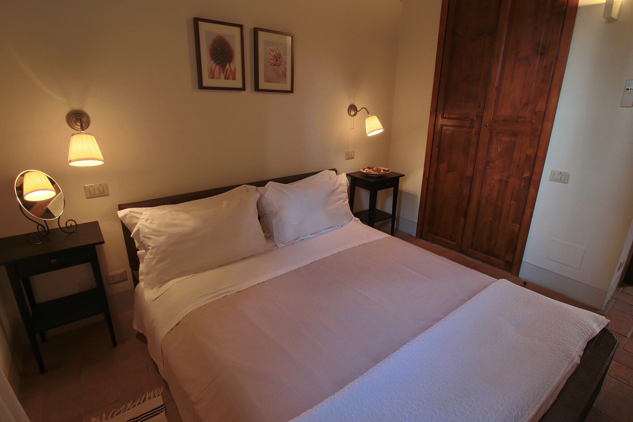 Ground floor: (Living room(double sofa bed, TV, DVD player), open kitchen(coffee machine(espresso), oven, microwave, dishwasher, fridge-freezer), bedroom(double bed), bathroom(shower, washbasin, toilet), air conditioning)\n\nterrace(roofed), garden(shared with other guests, fenced, > 1000 m2), BBQ(shared with other guests), swimming pool(shared with other guests, fenced, 13 x  6 m., opened from 1/2 May upto and including Sep)