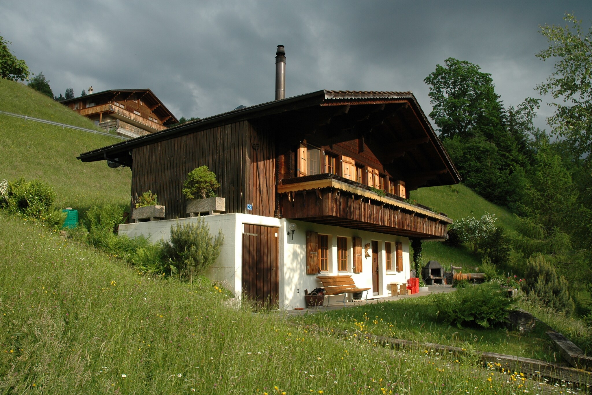 Enjoy a stay in Horboden. This wonderful chalet with an amazing view of Turnen has 2 bedrooms and hosts 4 people. A family can stay here and enjoy the heating, terrace, and barbecue.
There are many places to visit like Gstaad, Lenk, Thun, and Grindelwald. You can also take a day trip to Berne and Valais with Zermatt and the Aletsch Glacier. The Lake and public swimming pool at 18 km invite you for a swim. Facilities like supermarkets and the town center are at 8 km and restaurants can be found very near to 200 m.
The chalet is comfortable and cozy with a heating and wood stove in the living room. The kitchen comes with an oven and dishwasher.  The property also provides a double bed and a bunk bed. The terrace and furnished garden are ideal to spend your evenings enjoying the barbecue. Parking is also arranged here.
Check-in between 3–6 PM and check-out between 8–10 AM.
