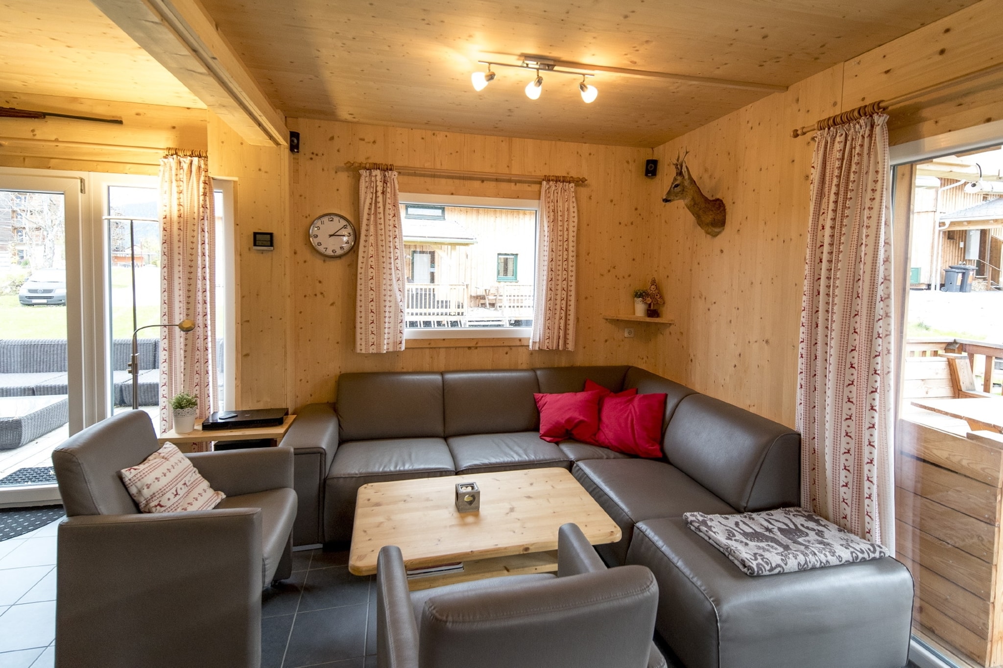 "Discover unparalleled comfort and luxury in our exclusive deluxe chalet, offering 110m² of beautifully designed living space for up to 10 guests. This remarkable holiday home features premium amenities, including a soothing whirlpool and an infrared sauna, ensuring a relaxing retreat after a day of alpine activities. The chalet boasts five elegantly appointed bedrooms, each furnished with a double bed, providing ample space for families or groups. With two modern bathrooms equipped with either a shower or an indoor whirlpool tub, and hairdryers provided, convenience is a priority.
Located in St. Georgen ob Murau, Murau-Murtal, Styria, our Kreischberg Chalets offers a premier location right at the Kreischberg valley station, providing direct access to skiing and outdoor adventures. Your stay also includes the Murau-Murtal GuestCard (summer), offering additional local benefits.
The spacious living-dining area is designed for both relaxation and socializing, featuring a cozy seating arrangement and a flat-screen TV for your entertainment. The open kitchen is fully equipped to cater to all your culinary needs, including a ceramic hob, oven, dishwasher, and a fridge with a freezer compartment. Essential cookware, cutlery, a toaster, kettle, and coffee machine are also provided. To ensure a smooth arrival, a small starter set will be available, including dishwasher tabs, dishwashing liquid, a sponge, garbage bags, cleaning supplies, and a tea towel. Stay connected with free Wi-Fi and enjoy satellite TV throughout your stay."