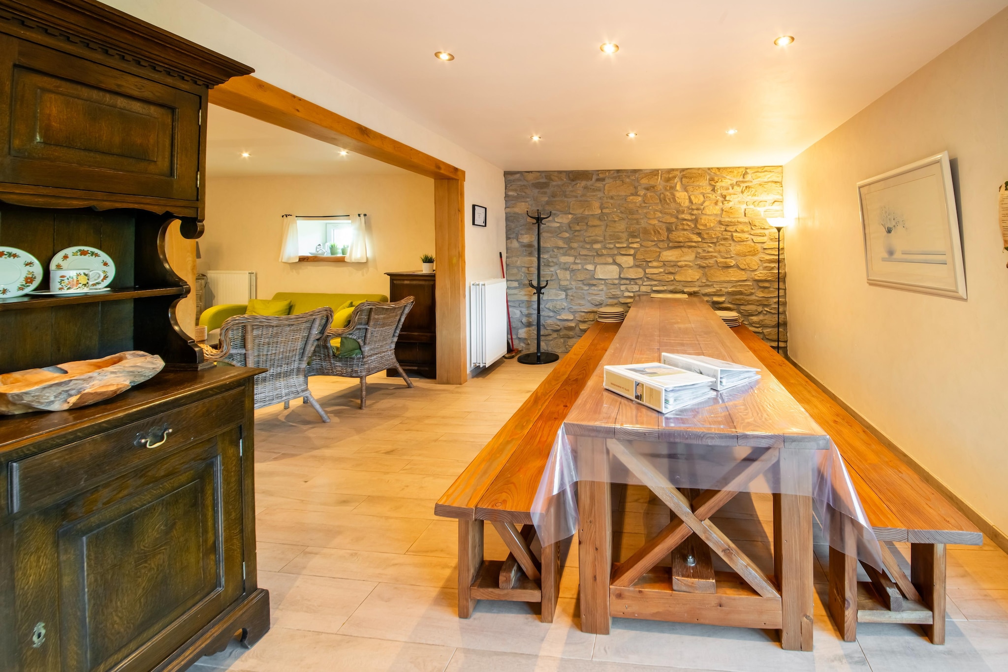 This beautifully renovated holiday home near Vielsalm is the perfect setting for a dream family getaway. With its stunning exterior, covered terrace, and peaceful surroundings, it offers a warm, relaxing retreat in the heart of the Belgian Ardennes. The house can also be partially rented (see house code BE-6690-71), making it ideal for flexible group sizes.

Located in a quiet village setting, it's perfect for exploring Malmédy, Liège, or enjoying scenic walks along Lake Robertville. The home is split into two self-contained units, each with its own entrance, making it ideal for two families or groups wanting both togetherness and privacy.

Enjoy meals with panoramic views on the covered terrace. The tranquil rural setting promises relaxation, but please note: maximum capacity is 16 guests, and extra visitors are not allowed, even during the day. Student parties, bachelor parties, and drinking parties are strictly prohibited, and the home is not rented to groups of youngsters to maintain peace in the area.