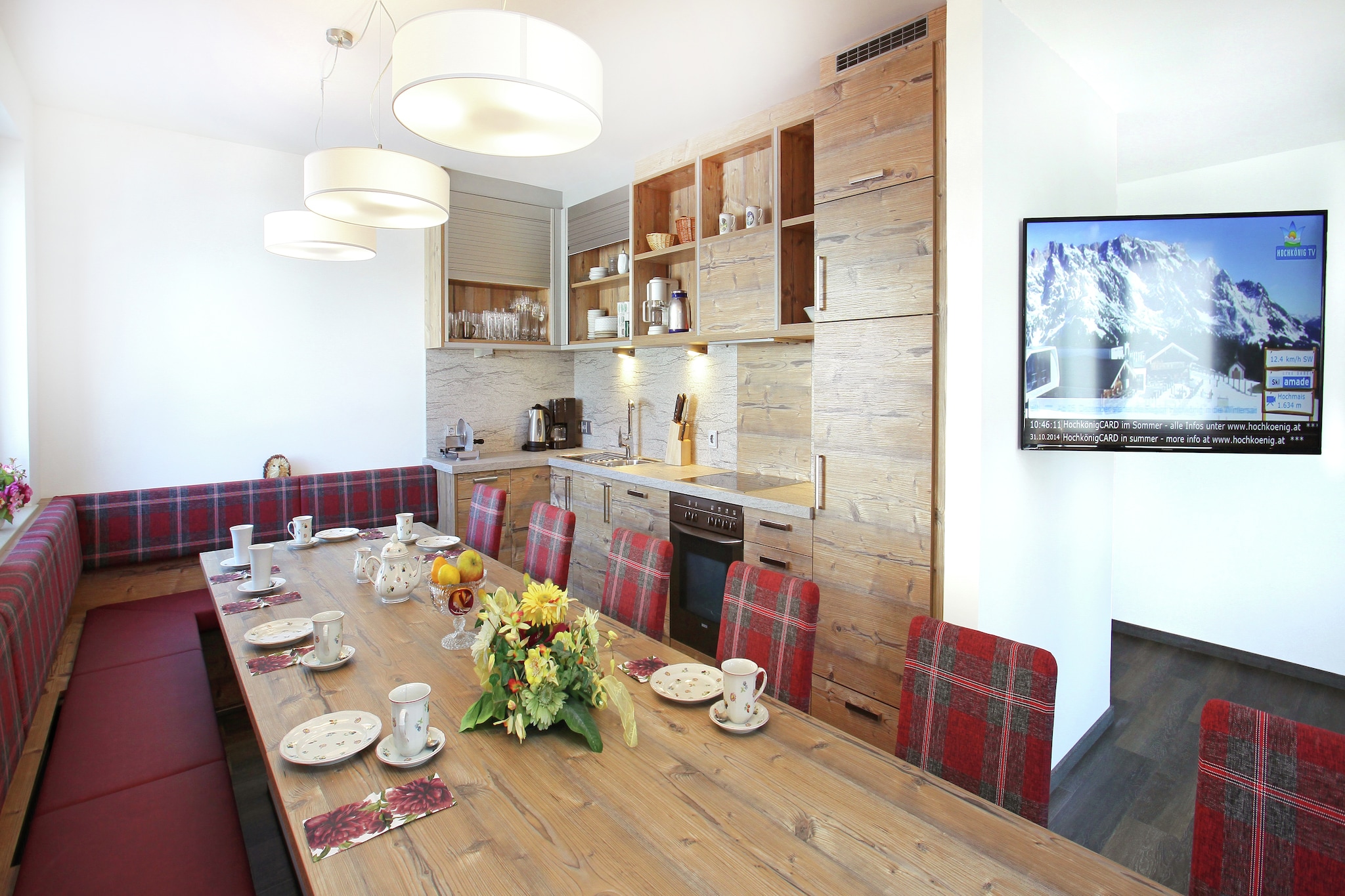 On the 1st floor: (Living room(TV, balcony), open kitchen(cooker(4 ring stoves), oven, dishwasher, fridge-freezer), bedroom(double bed), bedroom(single bed, bunk bed), walk-through bedroom(bunk bed, TV), bathroom(shower, washbasin, toilet), bathroom(shower, washbasin, toilet))\n\nOn the 2nd floor: (Bedroom with bathroom(double bed, TV, shower, washbasin, toilet, balcony), Bedroom with bathroom(double bed, shower, washbasin, toilet, balcony), Bedroom with bathroom(single sofa bed, double bed, TV, shower, washbasin, toilet, balcony), Bedroom with bathroom(single sofa bed, double bed, TV, shower, washbasin, toilet))\n\nrecreation room(shared with other guests)(table tennis table, table football), ski storage, heating(central), parking