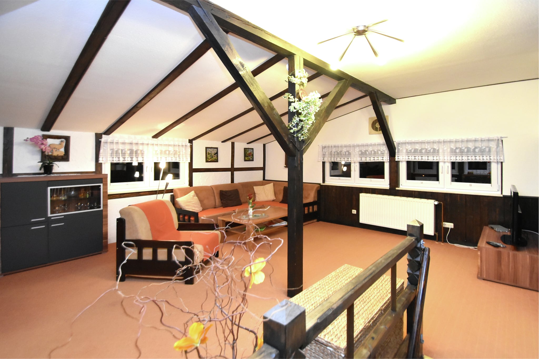 This charming two-level apartment in Rübeland offers a cozy and pet-friendly retreat with free WiFi, just 500 meters from the town center. Perfect for families, it’s ideally located near the famous Rübeländer caves—Baumannshöhle and Hermannshöhle—where visitors can explore stunning underground formations. For thrill-seekers, Harzdrenalin’s Megazipline at the Rappbodetalsperre promises unforgettable views and adrenaline. History lovers will enjoy Blankenburg Castle and Michaelstein Abbey nearby.
The property features a ground-floor bedroom with bunk beds and a bathroom with a bathtub and shower. Upstairs, guests enjoy a spacious dining room, a fully equipped kitchen, and a living/bedroom with a double sofa bed and satellite TV. Additional amenities include central gas heating, a private terrace, shared garden, electric barbecue, party games, bicycles, and child-friendly extras like a cot, swing set, and stair gate.
Surrounded by forest trails and close to ski slopes, swimming pools, and public transport, the location is ideal for year-round adventure. Dining options nearby include the rustic Restaurant Bodetal, the hearty Zum Alten Forsthaus Todtenrode, and the elegant Das Welfenzimmer.