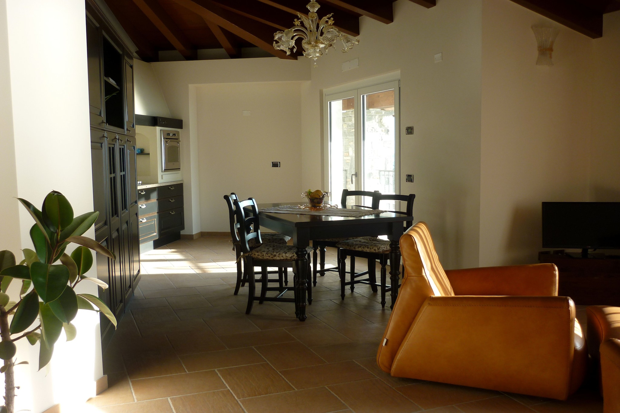 On the 2nd floor: (Entrance, open kitchen(oven, dishwasher, fridge, freezer), Living/diningroom(TV, balcony, air conditioning), bedroom(double bed, air conditioning), bedroom(bunk bed, air conditioning), bathroom(bath tub, shower, toilet, bidet, washing machine))\n\nheating, garden furniture