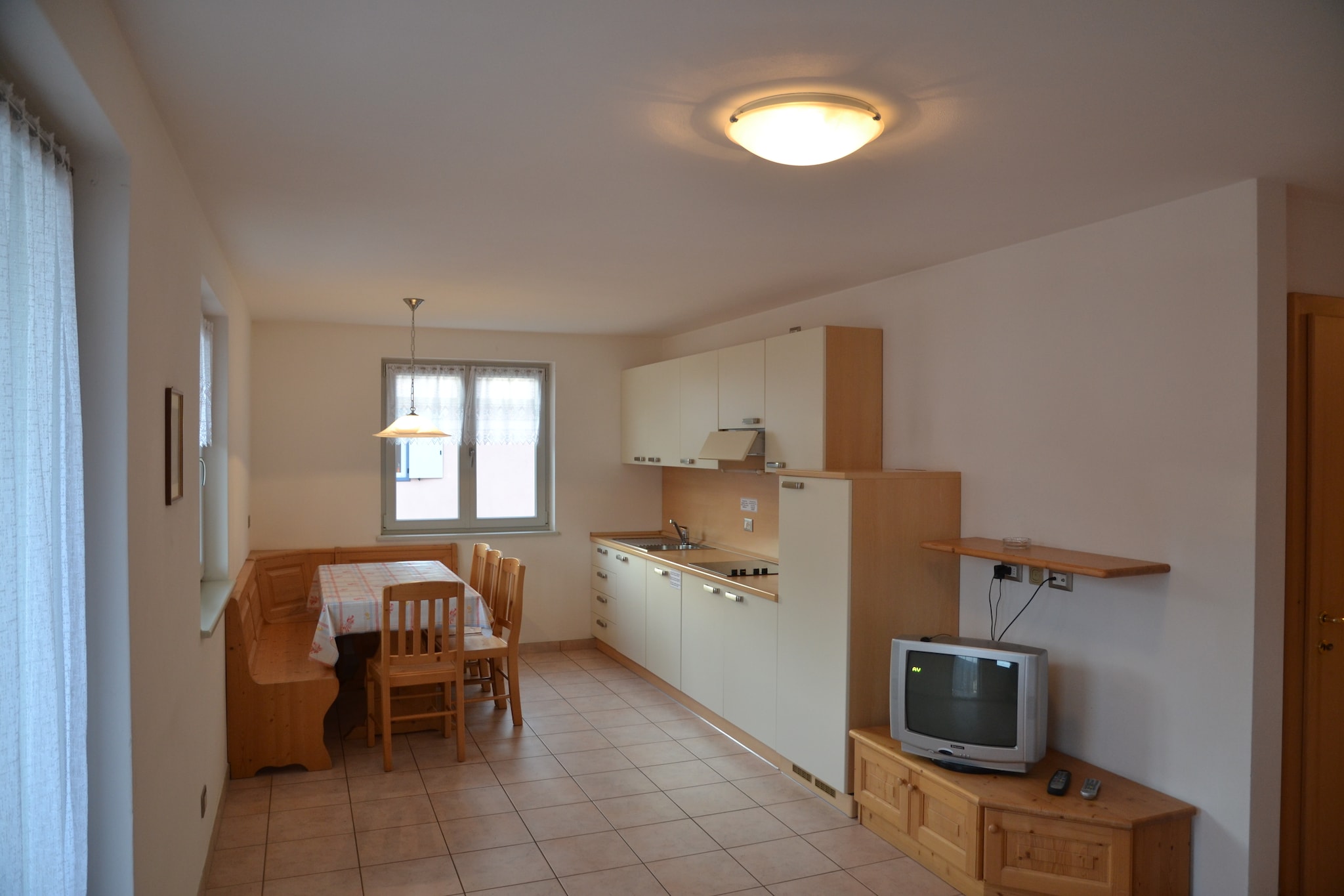 Kitchenette(dishwasher, fridge), Living/diningroom(double sofa bed, TV(satellite)), bedroom(double bed), bedroom(2x single bed), bathroom(shower, washbasin, toilet, bidet), washing room, ski storage(shared with other guests), garage, balcony, terrace(shared with other guests), garden(shared with other guests), parking