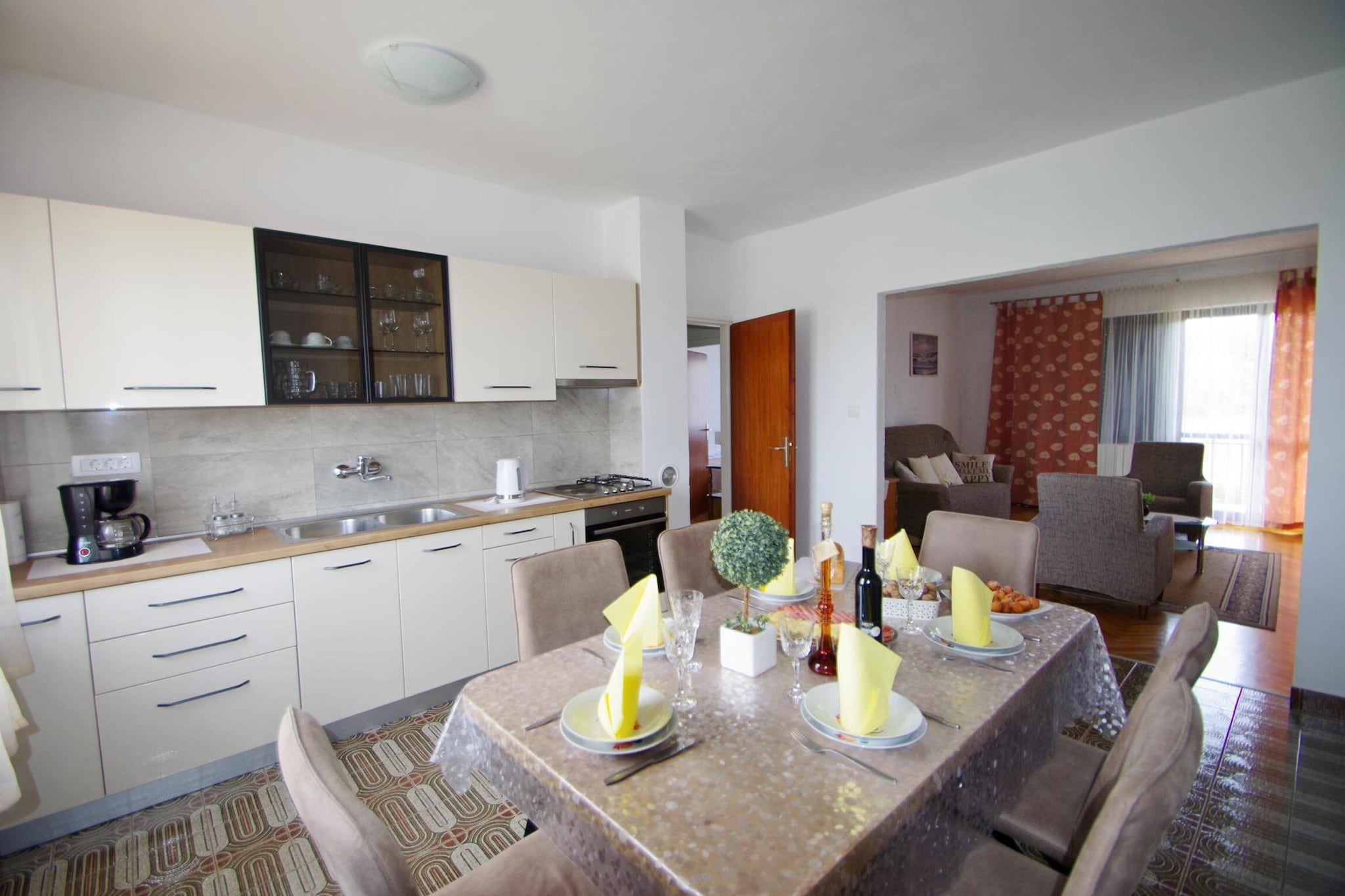 On the 1st floor: (Kitchen(cooker(4 ring stoves), coffee machine, oven, fridge-freezer), Living/diningroom(TV), bedroom(double bed), bedroom(double bed), bedroom(double bed), bathroom(bath tub, washbasin, toilet, washing machine), bathroom(shower, washbasin, toilet), air conditioning)\n\ngarden(fenced, 1000 m2), garden furniture, BBQ