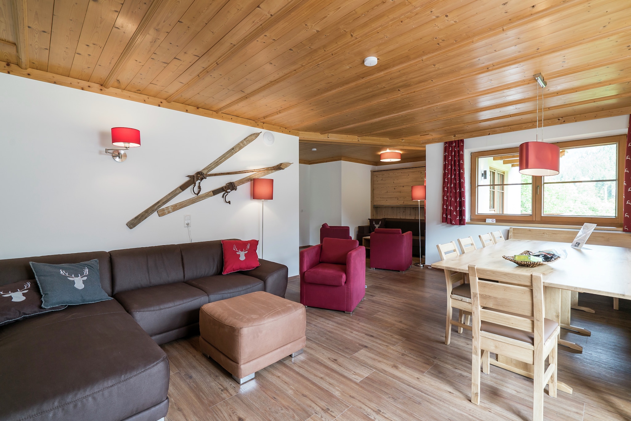 This cosy apartment in Saalbach-Hinterglemm, is close to the ski area and is surrounded by beautiful mountains. The well-furnished property features 3 bedrooms and is ideal for 12. The apartment has a balcony for enjoying views. Suitable for friends or families, guests can enjoy a hot barbecue in the garden and access free WiFi at this child-friendly property. This characteristic detached chalet close to the ski areas of Saalbach Hinterglemm and a short distance from well-known Zell am See offers plenty of space. It is furnished in a simple and robust way and is surrounded by a beautiful garden. 

Maishofen is an ideal starting point for your winter holiday, you can reach well-known Saalbach Hinterglemm or Zell am See/Kaprum for skiing in just a few minutes. Do you prefer to take the ski bus? This stops in both directions near the house. In the immediate vicinity you can go cross-country skiing, hiking or sledging. If you arrive in summer, you can quickly reach well-known places such as Zell am See, Salzburg or the well-known waterfalls of Krimml or the Großglocknerstrasse thanks to the central location. There are many golf courses in the immediate vicinity and the active vacationer can go rafting, mountain biking or hiking in the immediate vicinity.

In the hallway you will find a storage room for jackets and ski boots. The large living and dining room is comfortably furnished. In total you have 3 bedrooms and 2 bathrooms. There is also a cozy additional living room where you can watch TV. The apartment has a terrace and a garden.


About Belvilla

When you stay in a Belvilla home, you can rest assured of a unique holiday home in ideal surroundings at an attractive price. The portfolio of accommodations consists of more than 40,000-holiday homes in 20 European countries. Interested in a weekend getaway, a summer or winter sports holiday or simply a short break? Do you prefer the coast, the countryside or the mountains? Whatever your preference, there is a Belvilla home to meet your needs, from a cosy gîte for two to a castle big enough for the entire family, from an apartment in the heart of Rome to a cabin in the middle of nowhere, from a simple tree house to a luxury dream villa and from close to home to the other side of Europe.

A Belvilla home gives you the freedom to enjoy breakfast in your pyjamas or continue a good conversation into the morning hours without having to worry about the bar's closing time. Prepare gourmet meals with fresh local ingredients in your own kitchen and take advantage of having your own swimming pool to do as many cannonballs as you want! In other words, you can enjoy complete privacy in your home away from home.