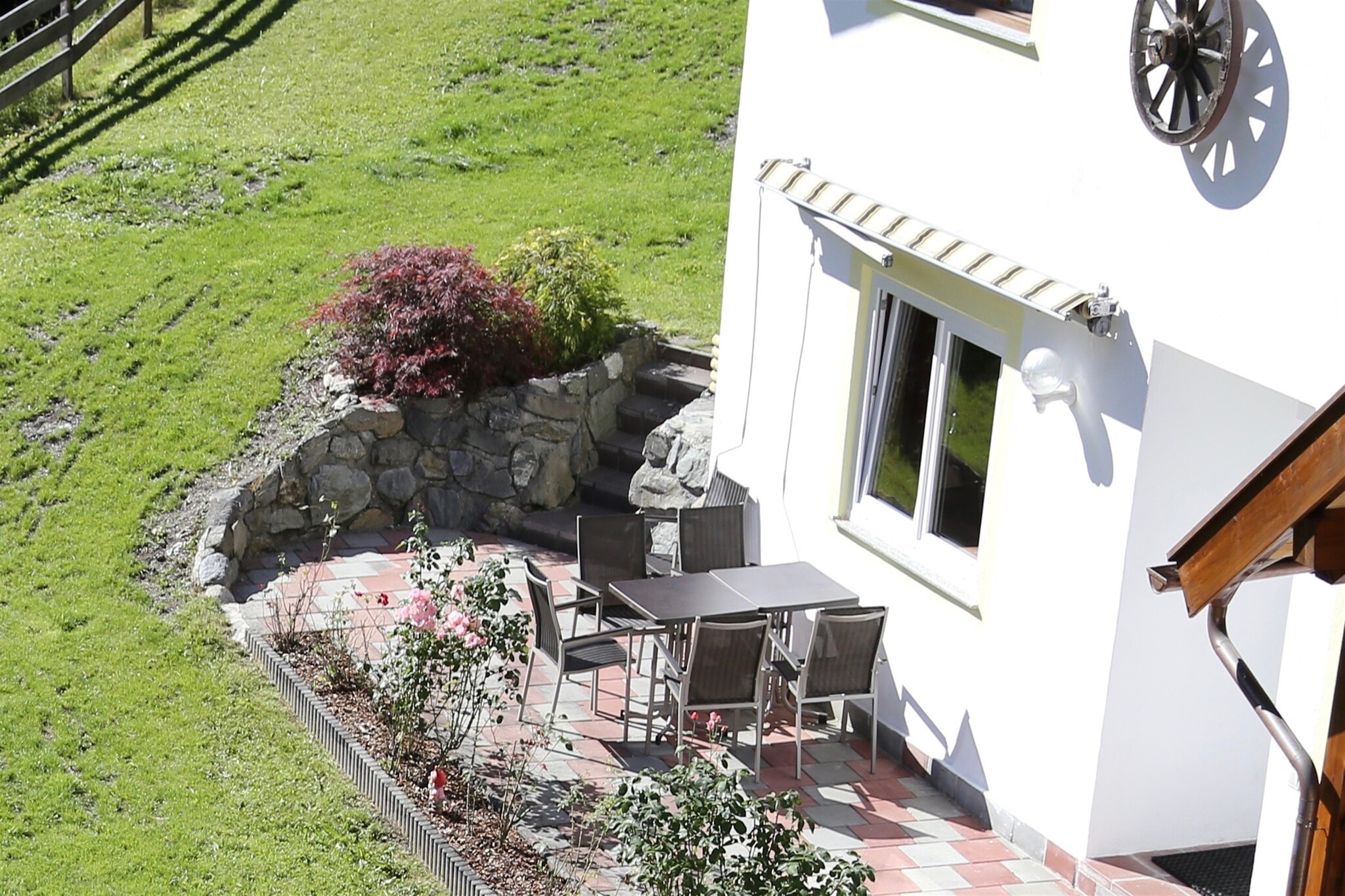 Ground floor: (open kitchen(cooker(ceramic), oven, microwave, dishwasher, fridge), Living/bed room(single bed, single trundle bed, single loft bed, TV), bedroom(2x single bed, TV), bedroom(bunk bed), bathroom(shower, washbasin, toilet), terrace)\n\nski storage(shared with other guests)(ski boot heaters), tumble dryer(shared with other guests), washing machine(shared with other guests), parking, children\'s bed, high chair