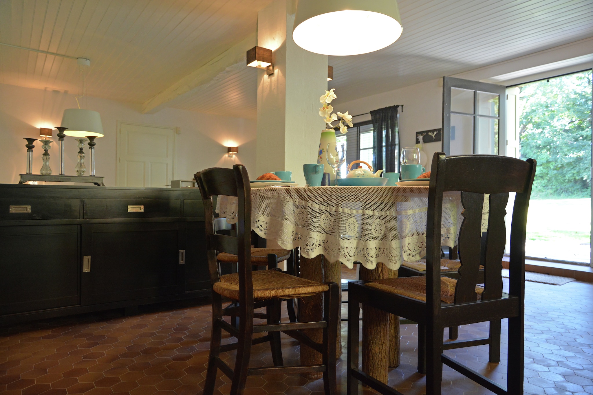 Ground floor: (open kitchen(cooker(5 ring stoves, gas), 2x coffee machine(cups, filter), dishwasher, fridge), Living/diningroom, bedroom(double bed, bunk bed), bathroom(shower, washbasin))\n\nterrace(private), garden(shared with the the owner and other guests), trampoline, play equipment