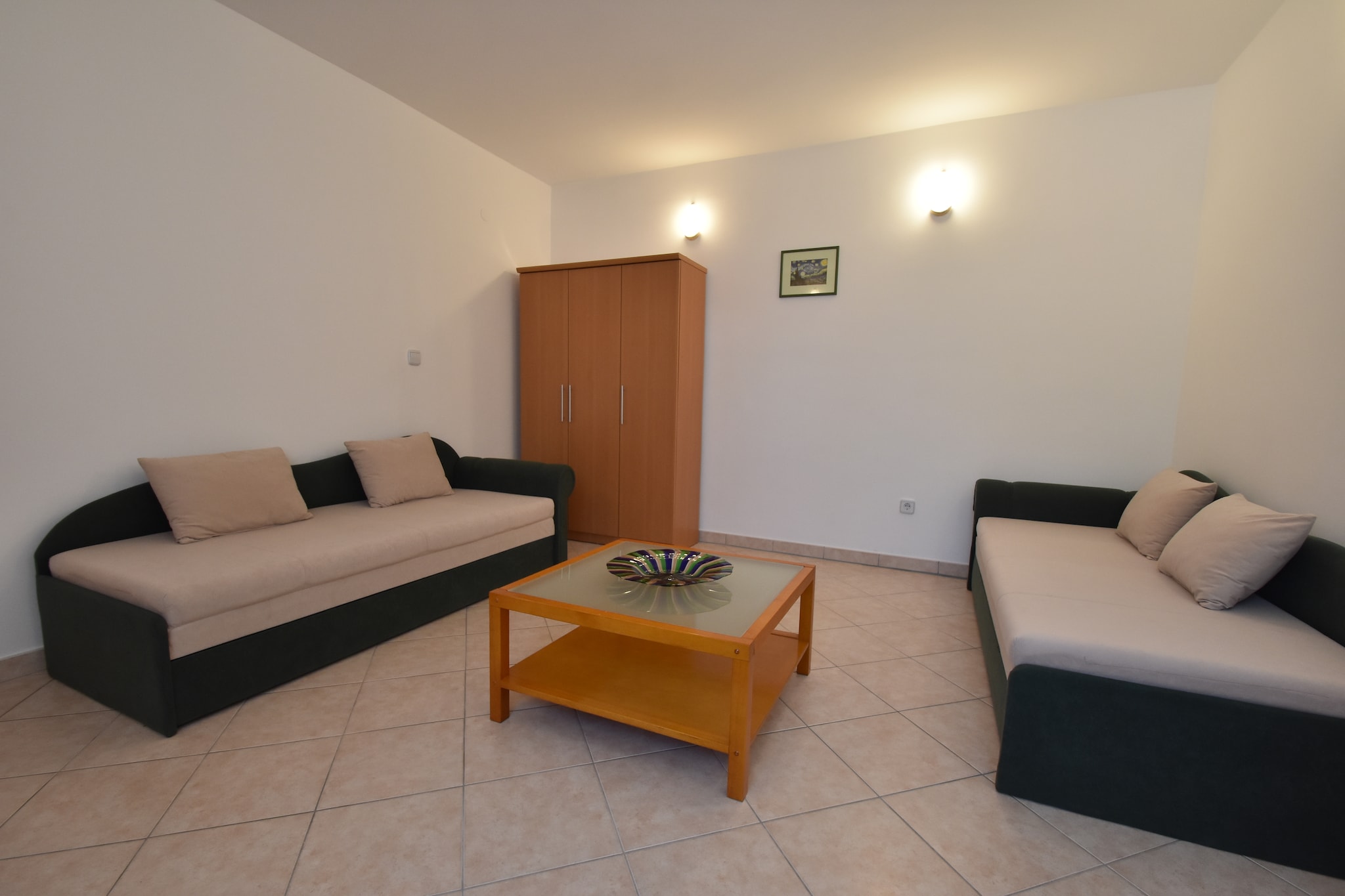A lovely apartment in Pula to welcome you in the culture of Croatia. Deep blue waters will greet you a km away. Free Wifi, Air-conditioning will make for a fun ride where you can do remote work as well.

With sea closeby, you can take make frequent beach-trips and get a tan. Restaurant, supermarket and town centre can be accessed conveniently. Arch of Sergii and Pula Arena lies a few minute's drive away and will give you a peek in the history an culture here.

Sofa bed and TV in the living room will let you be a couch-potato. Terrace and furnished garden are some spots to soak some sun while you enjoy your breakfast. Parking will keep your car safe, if you are planning a road trip or thinking about renting a car.

Pula Train Station is 3 km away.

About Belvilla

When you stay in a Belvilla home, you can rest assured of a unique holiday home in ideal surroundings at an attractive price. The portfolio of accommodations consists of more than 40,000-holiday homes in 20 European countries. Interested in a weekend getaway, a summer or winter sports holiday or simply a short break? Do you prefer the coast, the countryside or the mountains? Whatever your preference, there is a Belvilla home to meet your needs, from a cosy gÃ®te for two to a castle big enough for the entire family, from an apartment in the heart of Rome to a cabin in the middle of nowhere, from a simple tree house to a luxury dream villa and from close to home to the other side of Europe.

A Belvilla home gives you the freedom to enjoy breakfast in your pyjamas or continue a good conversation into the morning hours without having to worry about the bar's closing time. Prepare gourmet meals with fresh local ingredients in your own kitchen and take advantage of having your own swimming pool to do as many cannonballs as you want! In other words, you can enjoy complete privacy in your home away from home.