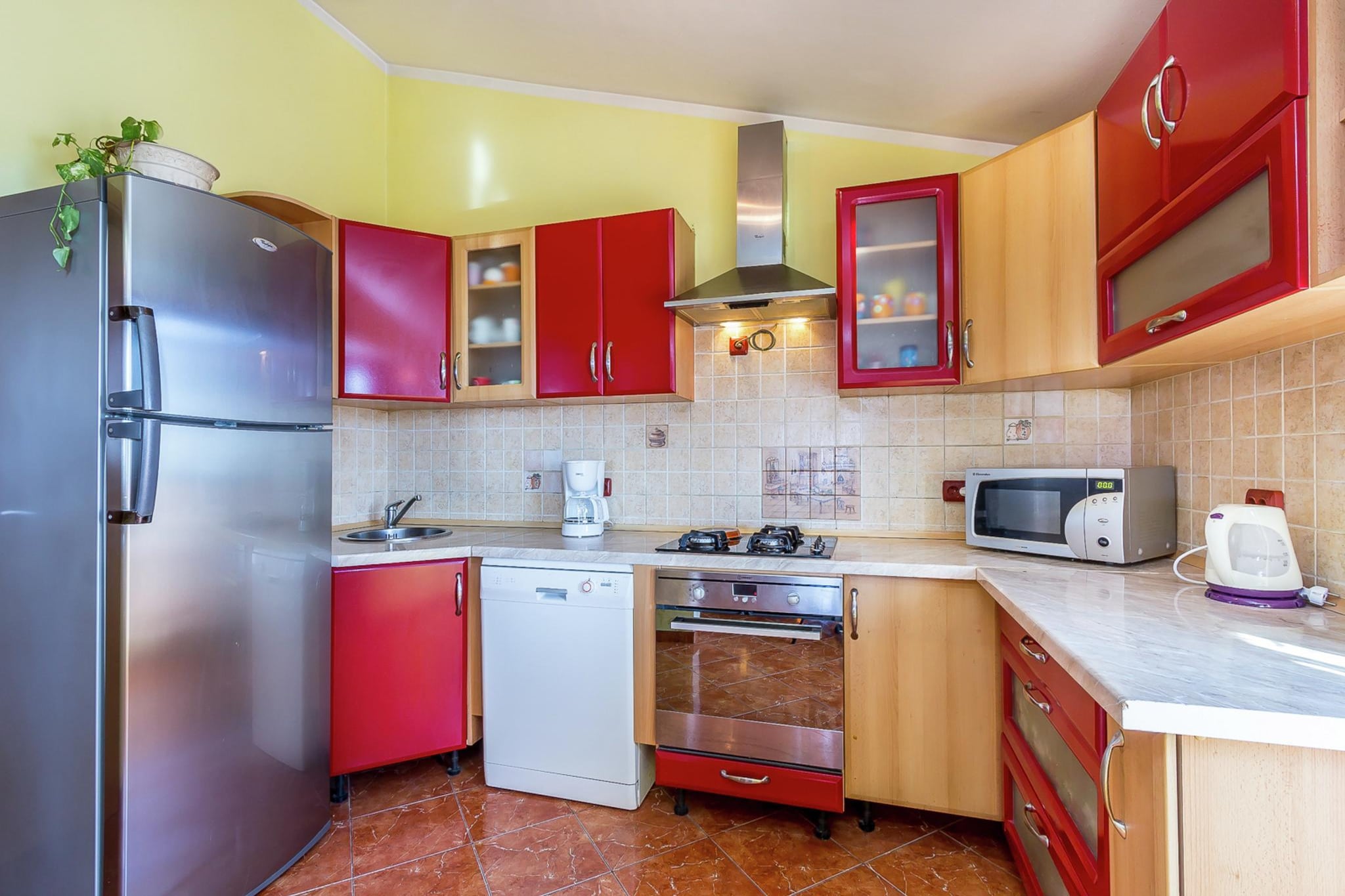 Ground floor: (open kitchen(electric kettle, cooker(4 ring stoves, gas), coffee machine(filter), oven, fridge-freezer), Living/diningroom(double sofa bed, dining table, seating area), bedroom(double bed(160 x 200 cm)), bedroom(double bed(160 x 200 cm)), bedroom(2x single bed, small double bed), bathroom(shower, washbasin, toilet), bathroom(shower, washbasin, toilet), terrace(roofed))\n\nOn the 1st floor: (open kitchen(electric kettle, cooker(4 ring stoves, gas), coffee machine, oven, microwave, dishwasher, fridge-freezer), Living/diningroom(double sofa bed, TV(flatscreen, satellite), dining table, fireplace, air conditioning), bedroom(double bed(160 x 200 cm)), bedroom(double bed(160 x 200 cm)), bedroom(double bed(160 x 200 cm)), bathroom(shower, washbasin, toilet), bathroom(shower, washbasin, toilet), balcony)\n\nwashing machine, air conditioning, garden(private, fenced), garden furniture, BBQ, parking, deckchairs, swimming pool(private,  7 x  3 m.), play equipment