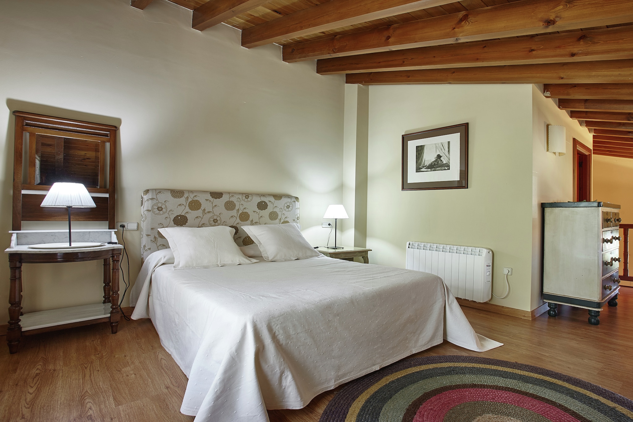 Ground floor: (Kitchen(cooker, coffee machine, microwave, dishwasher, fridge-freezer), Living/diningroom(double sofa bed, TV, fireplace), bathroom(shower, toilet), washing room(washing machine(shared with other guests), ironing board, iron), terrace(private), garden, garden furniture, BBQ, swimming pool(shared with other guests), children\'s bed)\n\nOn the 1st floor: (bedroom(double bed), bathroom(bathtub with shower, toilet))