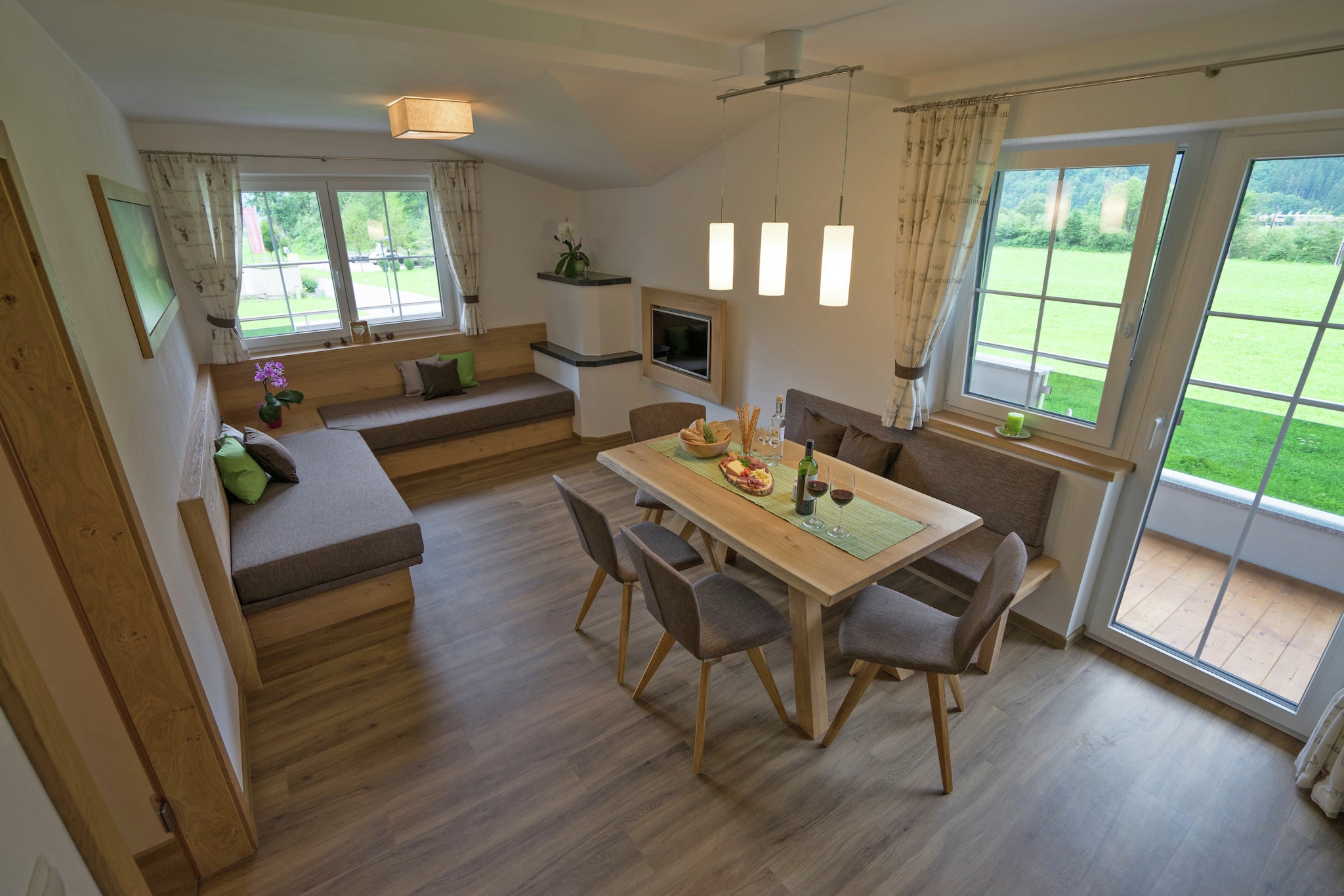 On the 1st floor: (open kitchen(cooker(4 ring stoves, induction), coffee machine, combination microwave, dishwasher, fridge-freezer), Living/bed room(single sofa bed, single sofa bed, TV(satellite), dining table), bedroom(double bed), bedroom(double bed), bathroom(shower, washbasin), toilet(washbasin), Landing)\n\nski storage, ski boot heaters, heating(floor heating), terrace, parking, children\'s bed, high chair