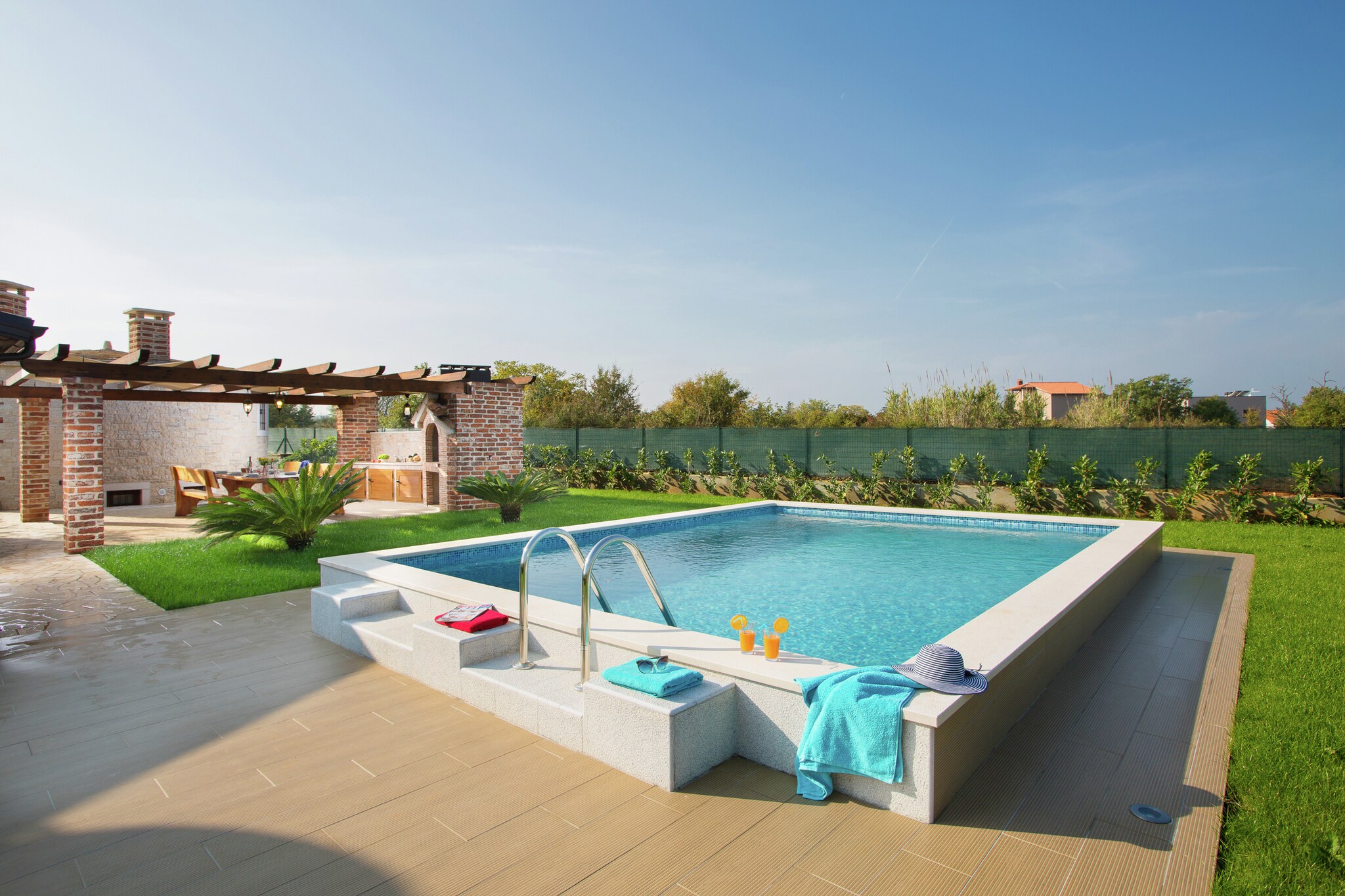This holiday home is in the Fažana region of Istria in Croatia. It can accommodate up to 4 guests and has a single bedroom. It is well suited for small families looking to spend a wonderful holiday together.
About Belvilla
When you stay in a Belvilla home, you can rest assured of a unique holiday home in ideal surroundings at an attractive price. The portfolio of accommodations consists of more than 40,000-holiday homes in 20 European countries. Interested in a weekend getaway, a summer or winter sports holiday or simply a short break? Do you prefer the coast, the countryside or the mountains? Whatever your preference, there is a Belvilla home to meet your needs, from a cosy gîte for two to a castle big enough for the entire family, from an apartment in the heart of Rome to a cabin in the middle of nowhere, from a simple tree house to a luxury dream villa and from close to home to the other side of Europe.
A Belvilla home gives you the freedom to enjoy breakfast in your pyjamas or continue a good conversation into the morning hours without having to worry about the bar's closing time. Prepare gourmet meals with fresh local ingredients in your own kitchen and take advantage of having your own swimming pool to do as many cannonballs as you want! In other words, you can enjoy complete privacy in your home away from home.