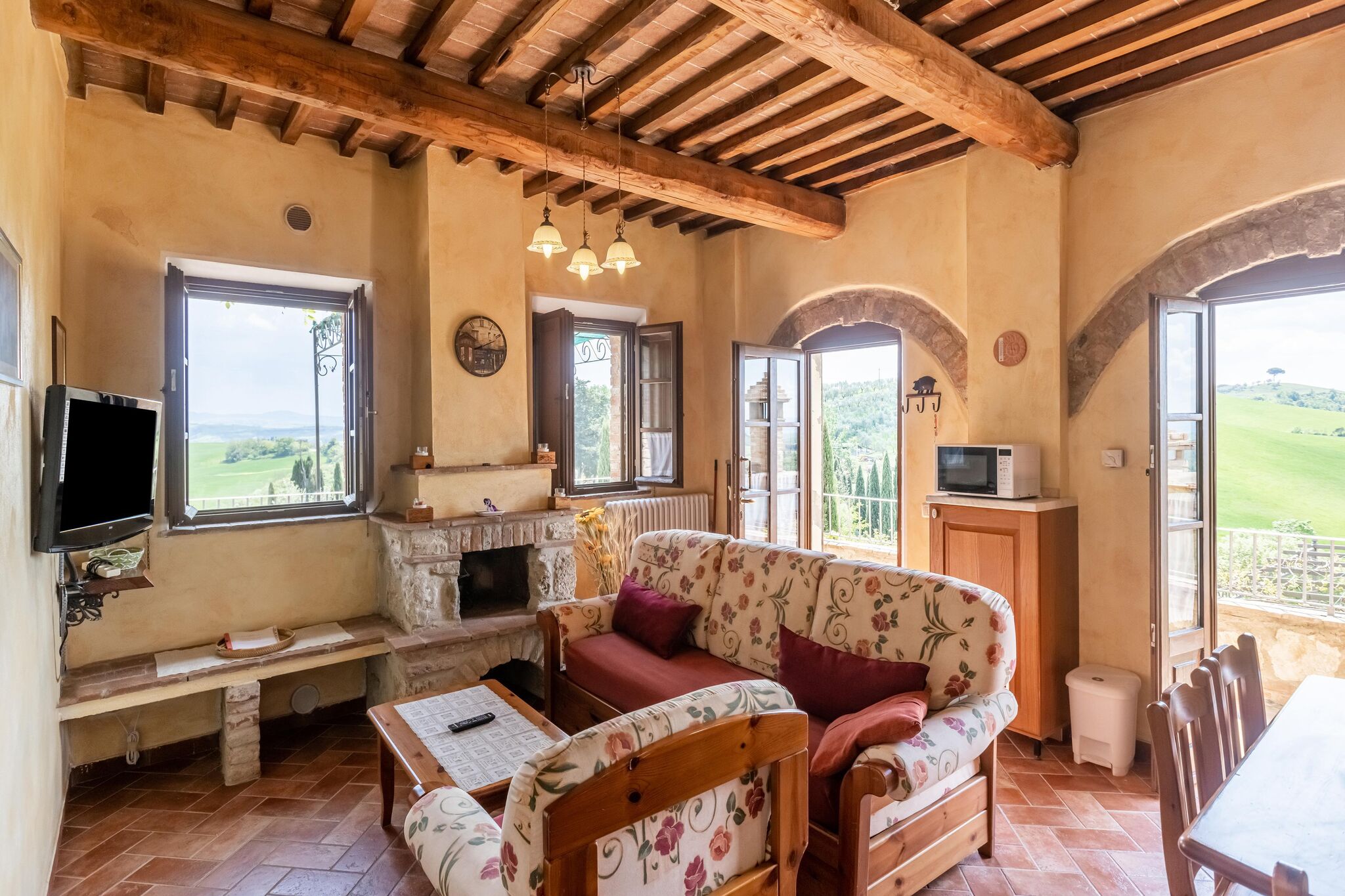 Luxueuse maison de vacances avec vue sur colline à Asciano