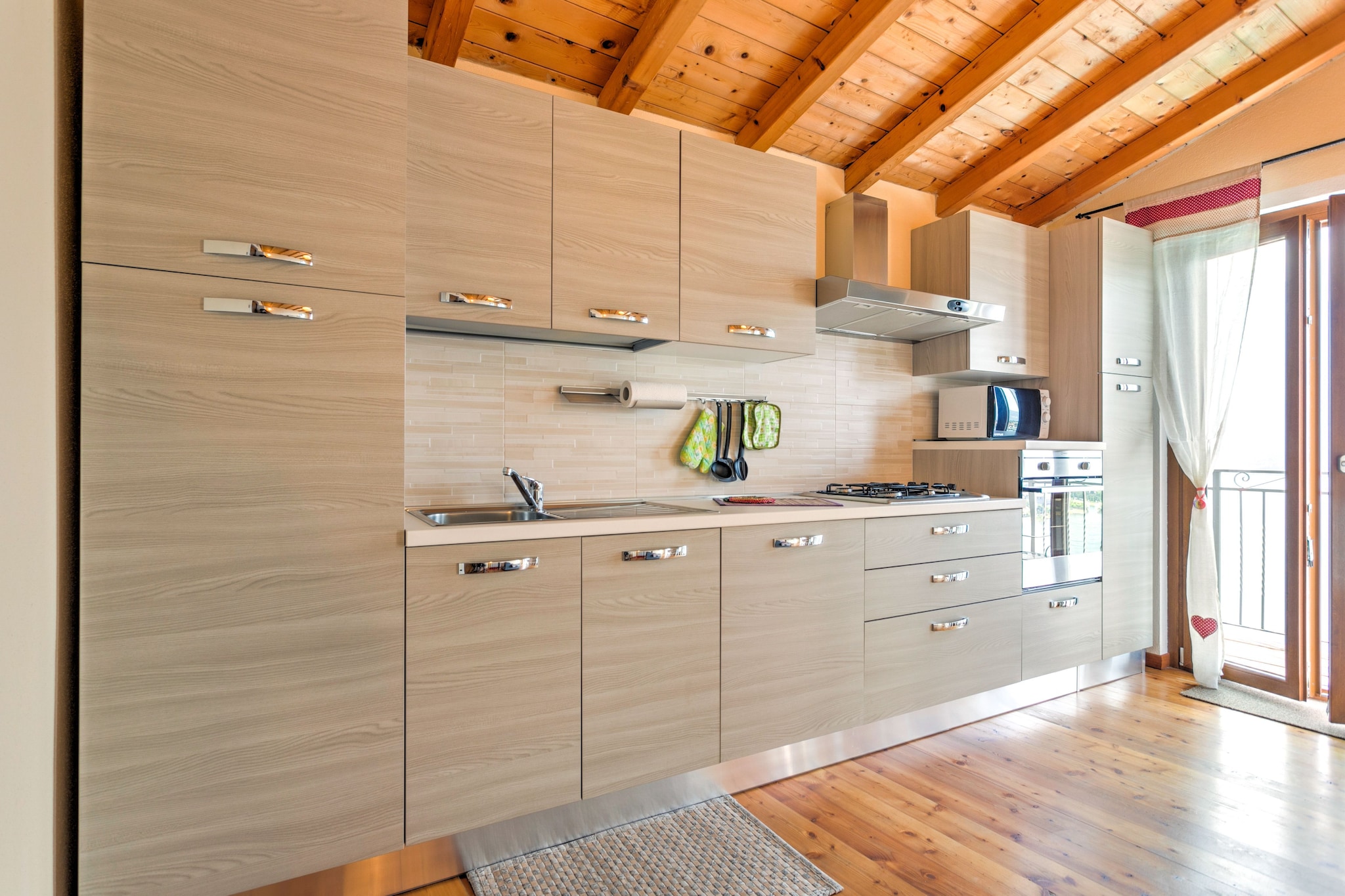 Ground floor: (bedroom(double bed), bathroom(shower, washbasin, toilet, bidet, washing machine))\n\nOn the 1st floor: (Entrance, open kitchen(oven, combination microwave, dishwasher, fridge-freezer), Living/diningroom(single sofa bed, TV(satellite)), balcony, garden furniture)\n\nwashing machine, heating(central), terrace(shared with other guests), garden(shared with other guests), garden furniture, parking, deckchairs, swimming pool(shared with other guests, 10 x 4 m., opened from 1/2 Apr upto and including Sep), lift